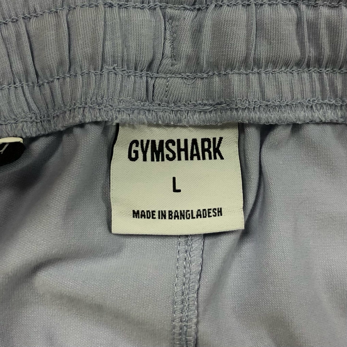Short Lounge Gymshark 🏋🏼♂️ color lila y logo en blanco Talla M y L