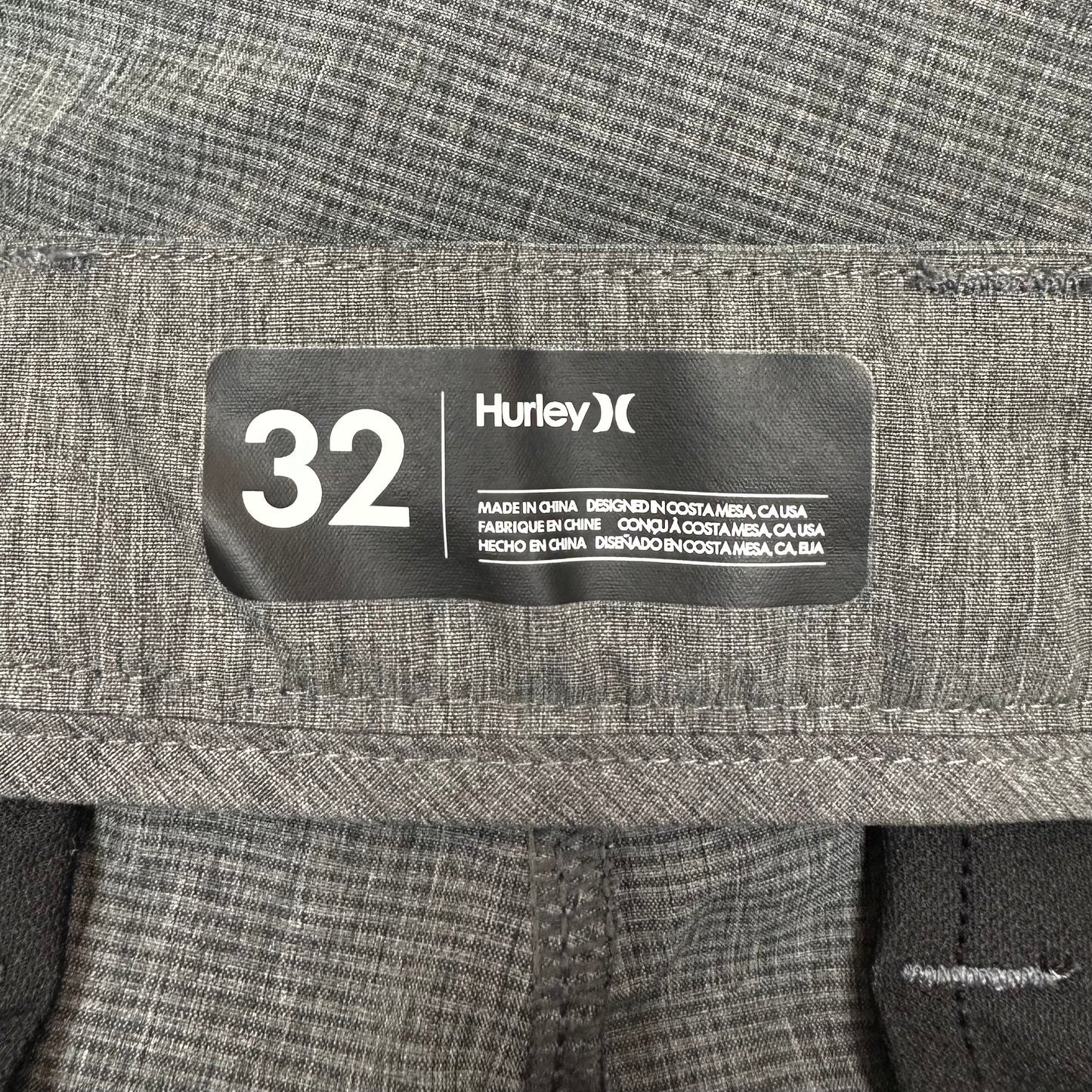 Short Casual Hurley 🏄🏽♂️ color gris claro talla 32