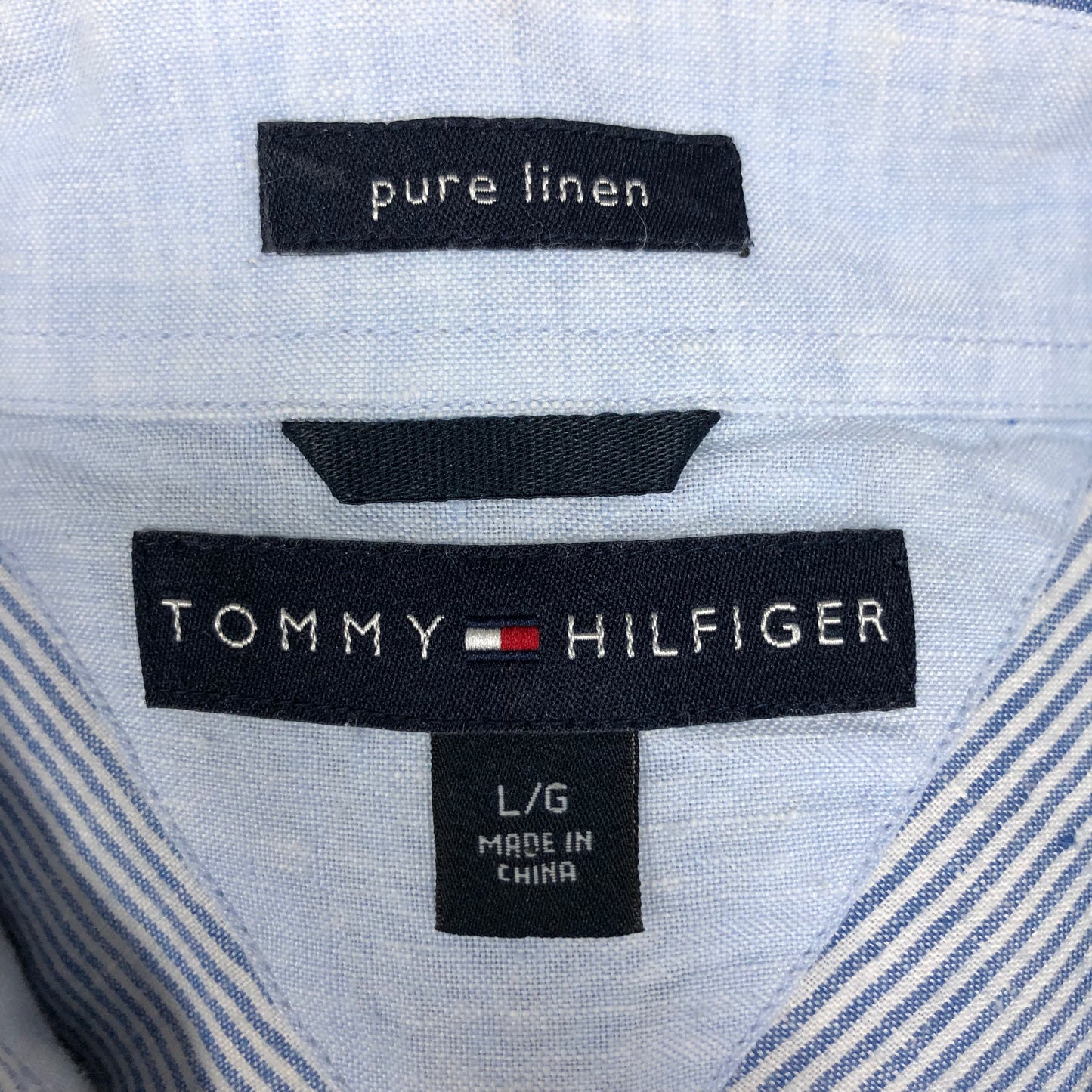 Camisa de botones Tommy Hilfiger 🇺🇸 de lino con rayas finas en color celeste y blanco Talla L Entalle Regular