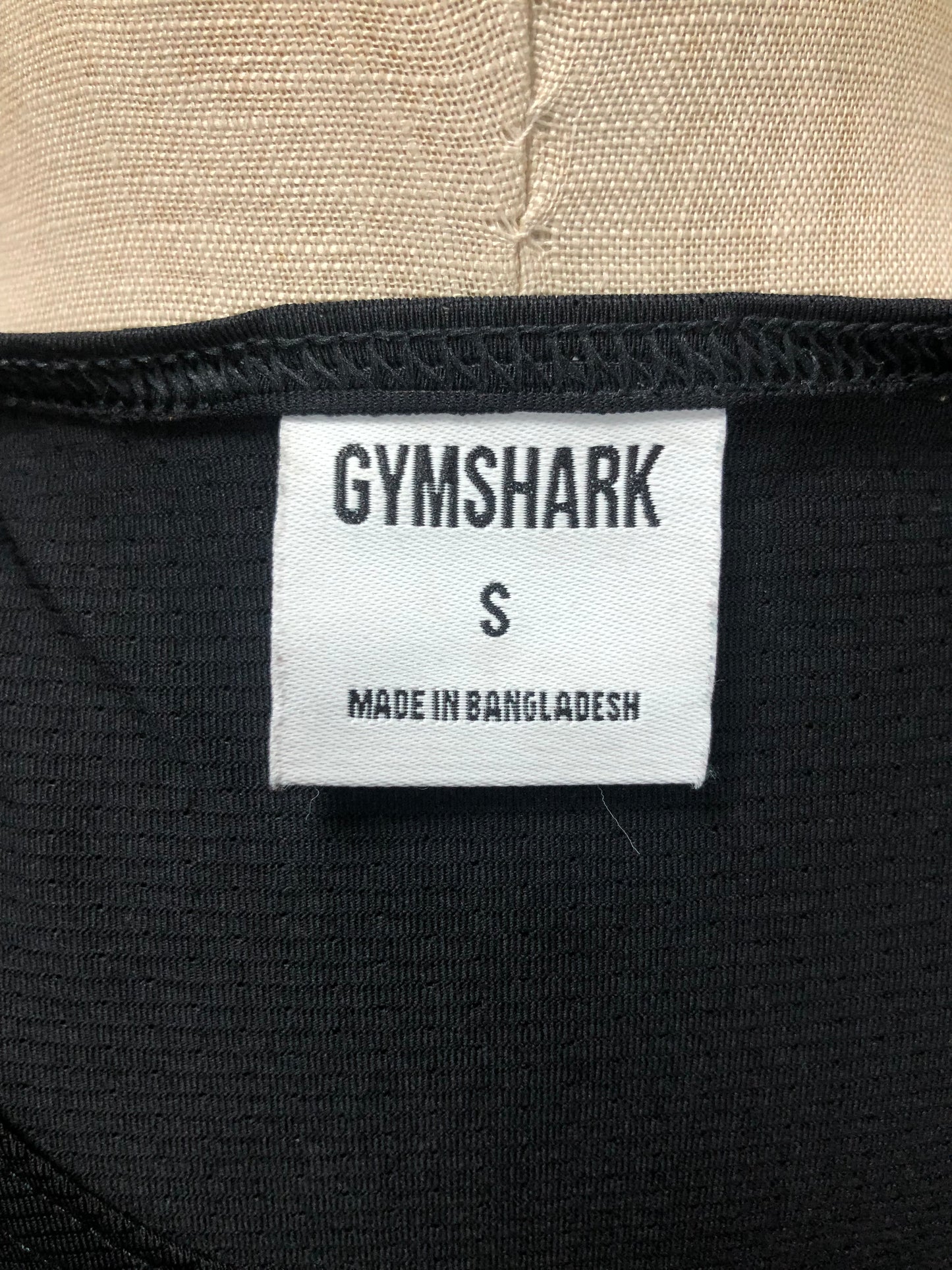 Camiseta de entrenamiento sin mangas Gymshark 🏋🏽 color negro y logo en blanco Talla S