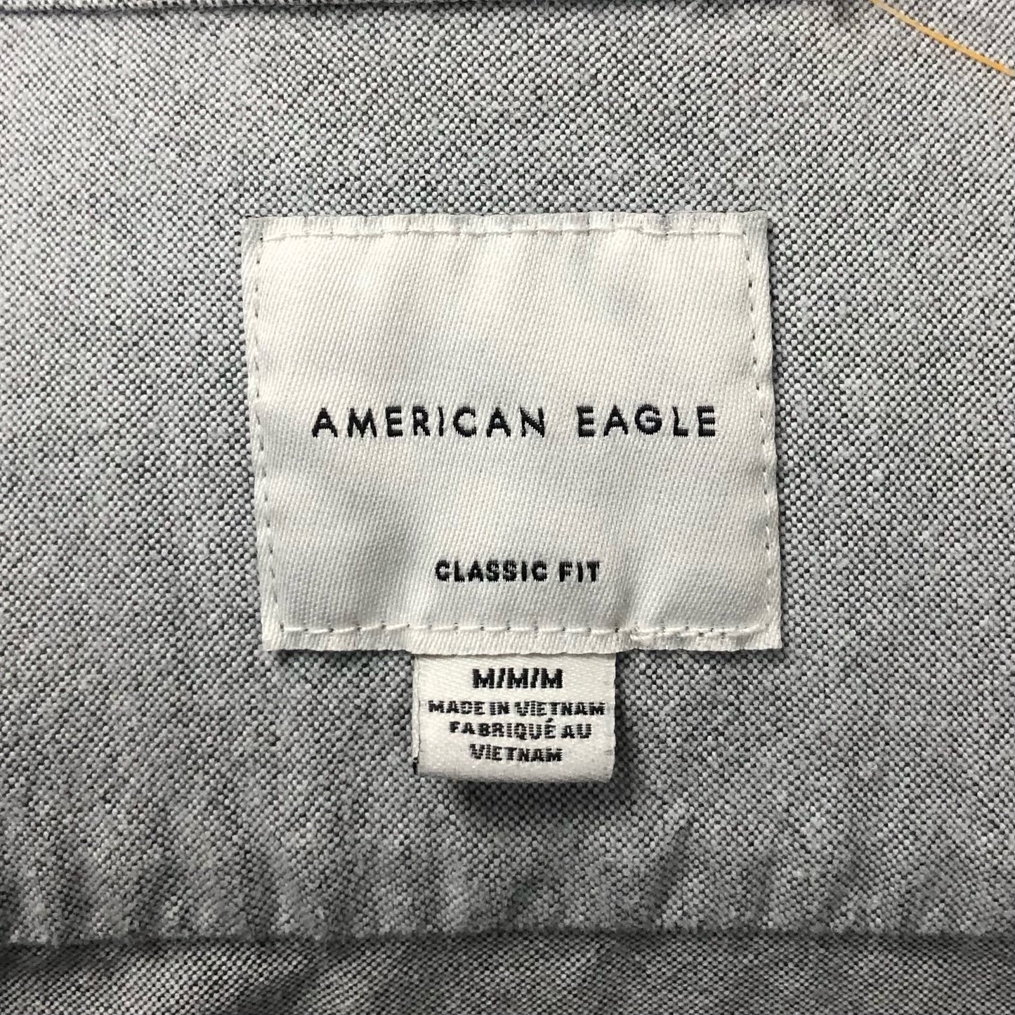 Camisa de botones American Eagle 🦅 Oxford color gris claro Talla M Entalle Clásico