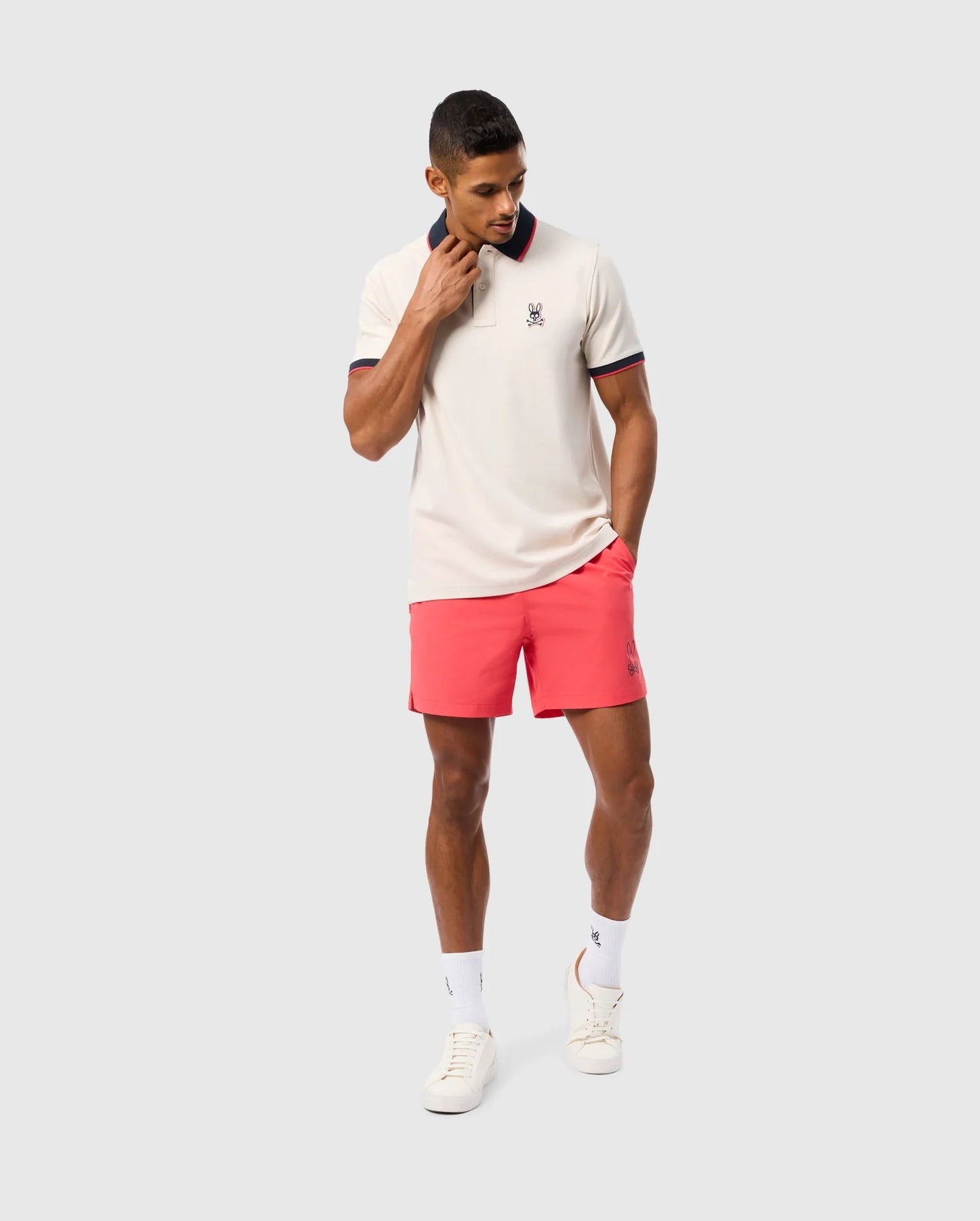 Camiseta Polo Psycho Bunny 🐰 Pique en color crema y diseño de cuello Talla M Entalle Regular