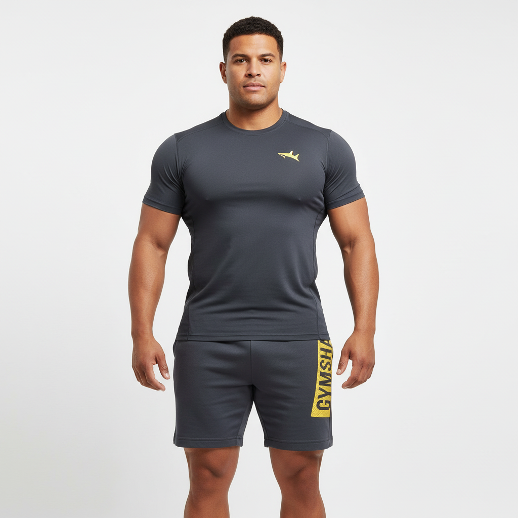 Short Lounge Gymshark 🏋🏼♂️ color gris oscuro y logo en amarillo Talla M