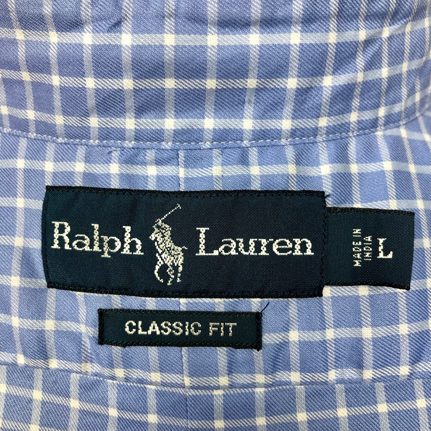 Camisa Polo Ralph Lauren 🏇🏼 color Celeste con patron de cuadros en blanco Talla L Entalle Clásico
