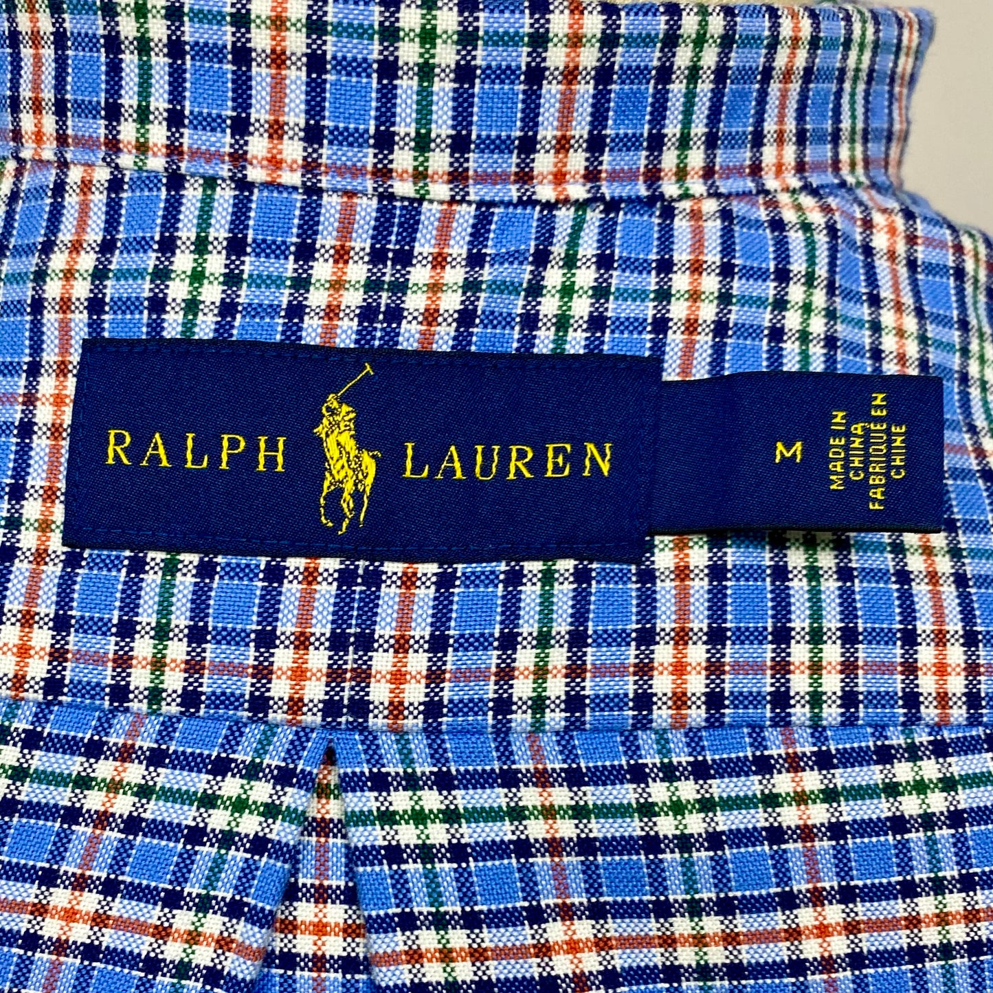 Camisa Polo Ralph Lauren 🏇🏼 Oxford color celeste con patron de cuadros en rojo y blanco Talla M Entalle Regular