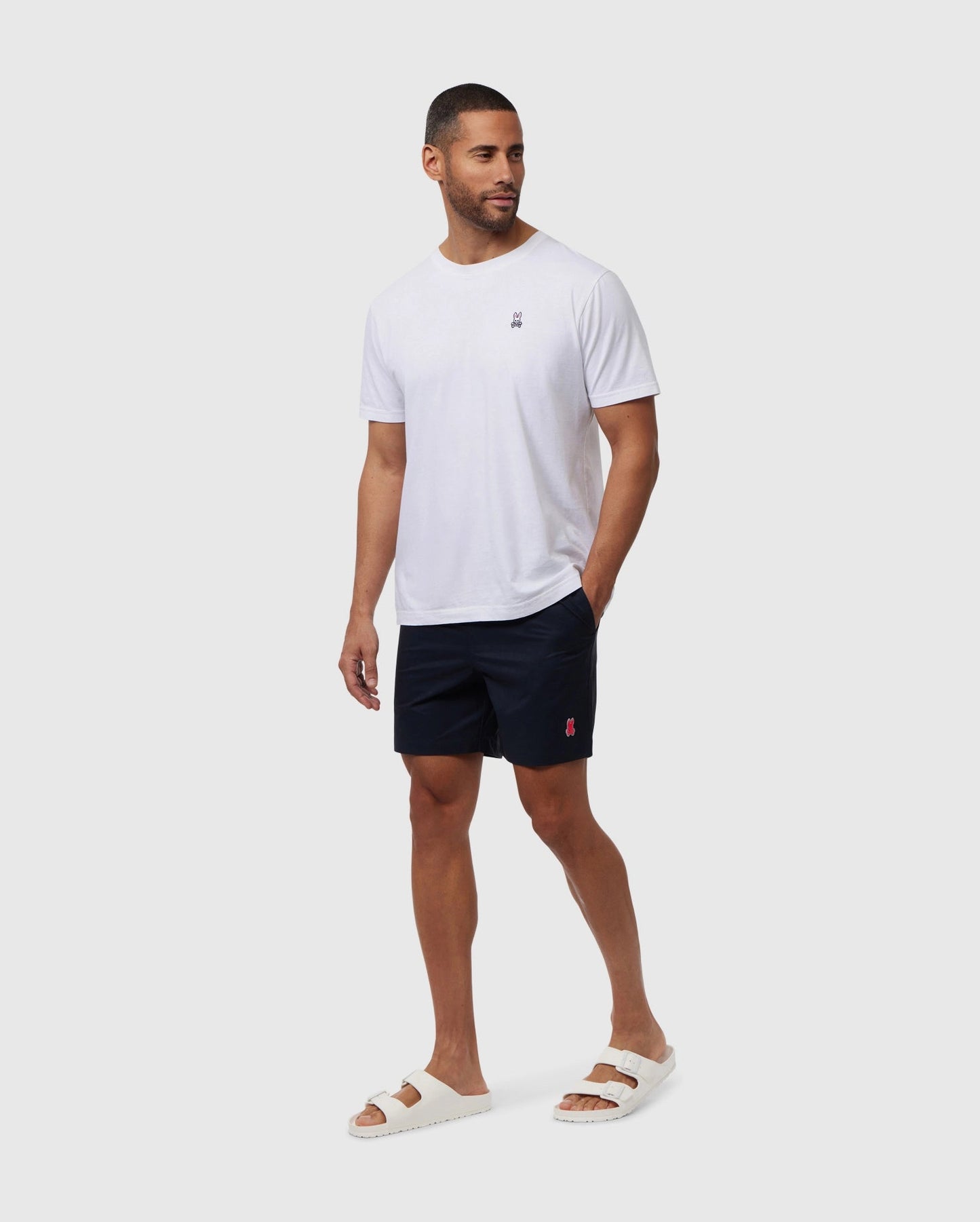 Short de baño Psycho Bunny 🐰 color azul navy y logo tradicional en naranja intenso Talla M