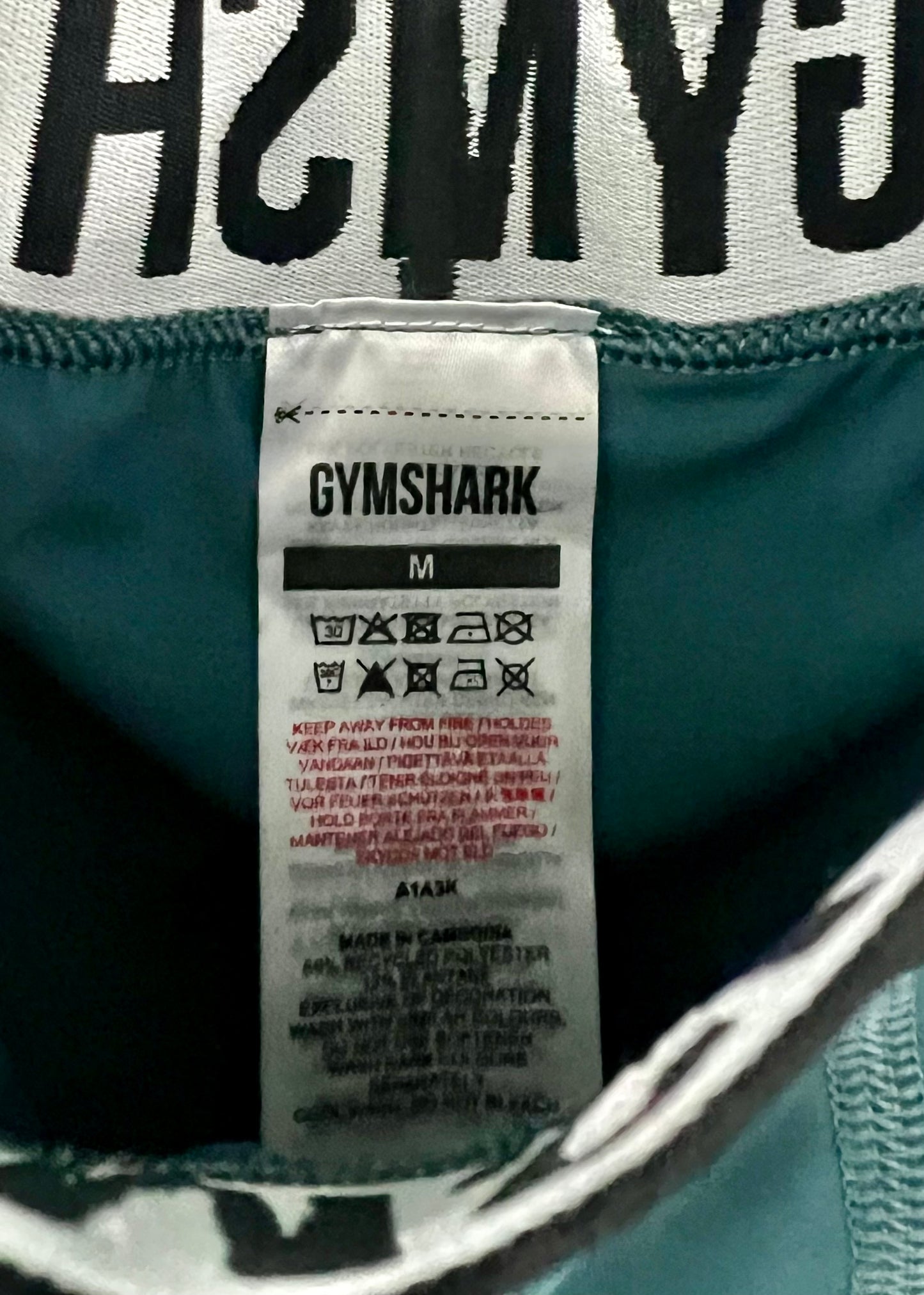 Mallas de entrenamiento Gymshark 🏋🏽 para hombre en Color verde azulado y logo en blanco Talla M