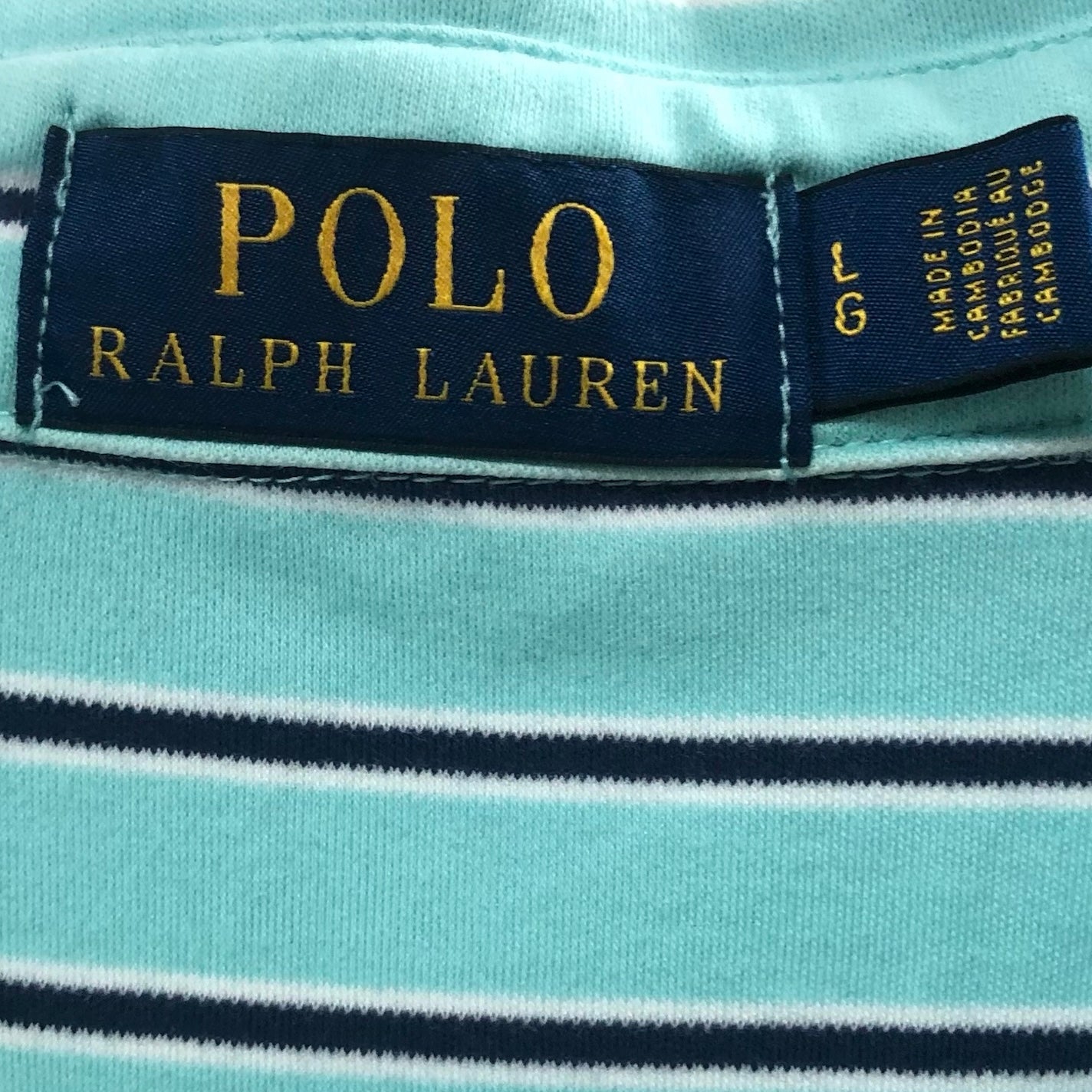 Camiseta Polo Ralph Lauren 🏇🏼 color turquesa con patrón de rayas color negro y blanco Talla L Entalle Regular