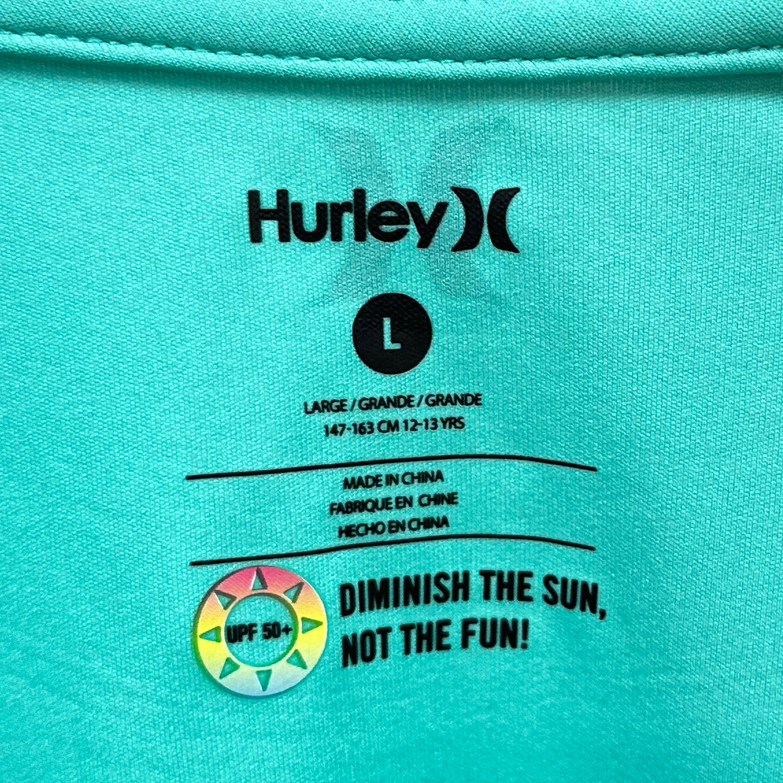 Camiseta de baño Hurley 🏄🏽♂️ color turquesa con logo en negro Talla L de niño