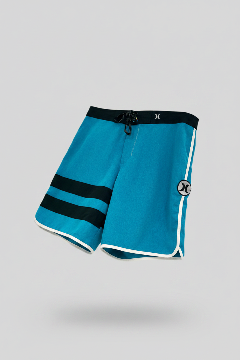 Short de baño Hurley 🏄🏽♂️ color turquesa y diseño de rayas en negro talla 34 (L)