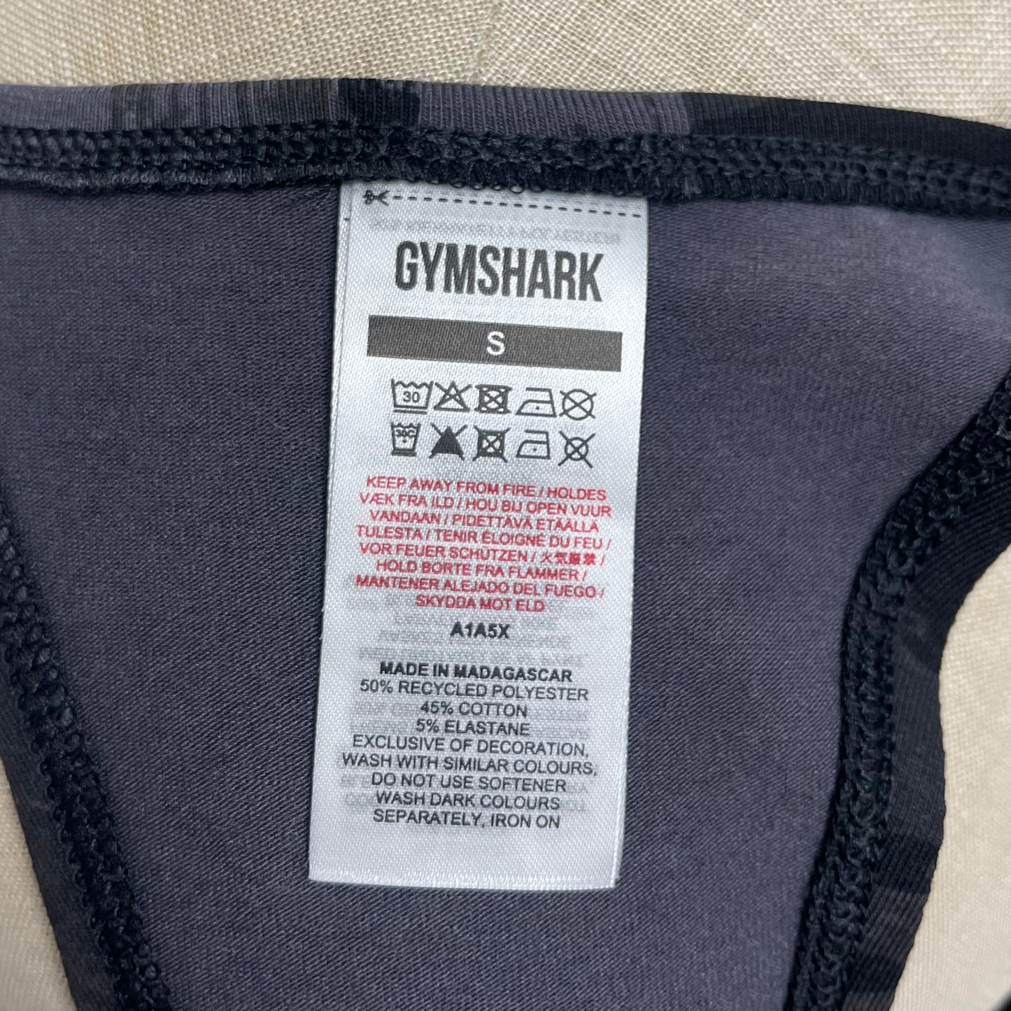 Camiseta de entrenamiento sin mangas Gymshark 🏋🏽 Diseño en color gris oscuro y negro Talla S