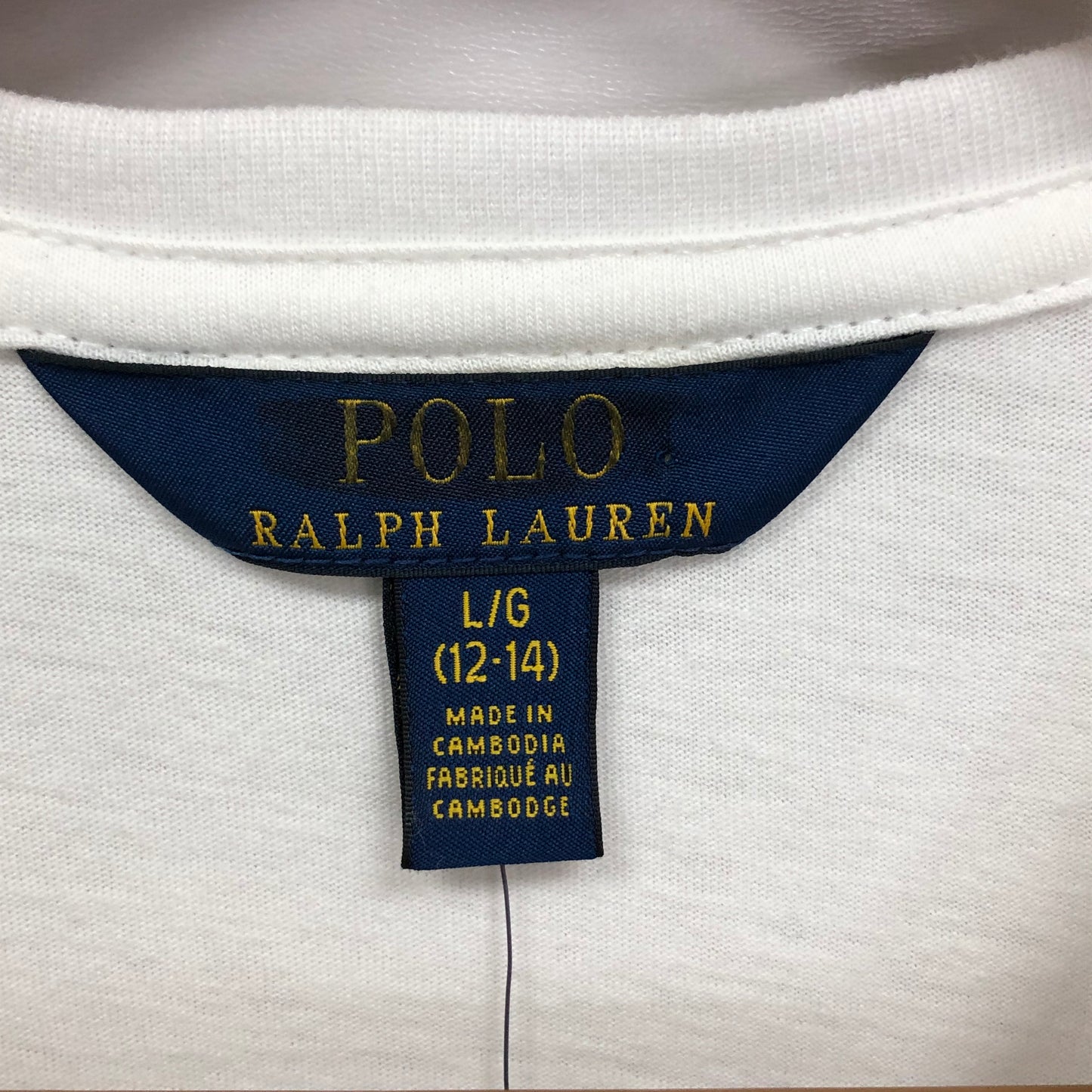 Camiseta cuello redondo de niña Ralph Lauren 🏇🏼 color blanco y logo en letras azul Talla L (12-14) Entalle Regular