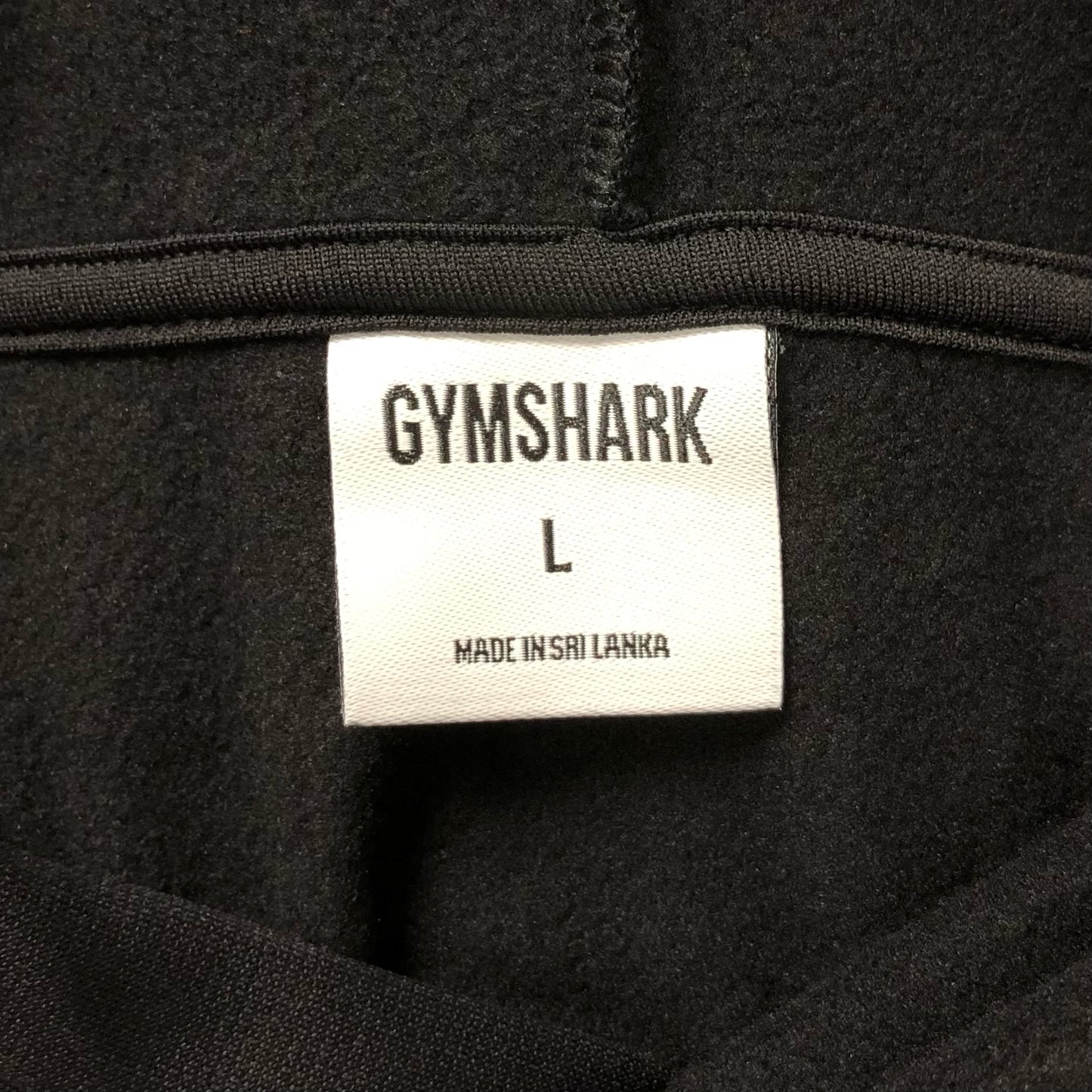 Sudadera Hoodie con capucha Gymshark 🏋🏽 color negro reflectante Talla L y XL