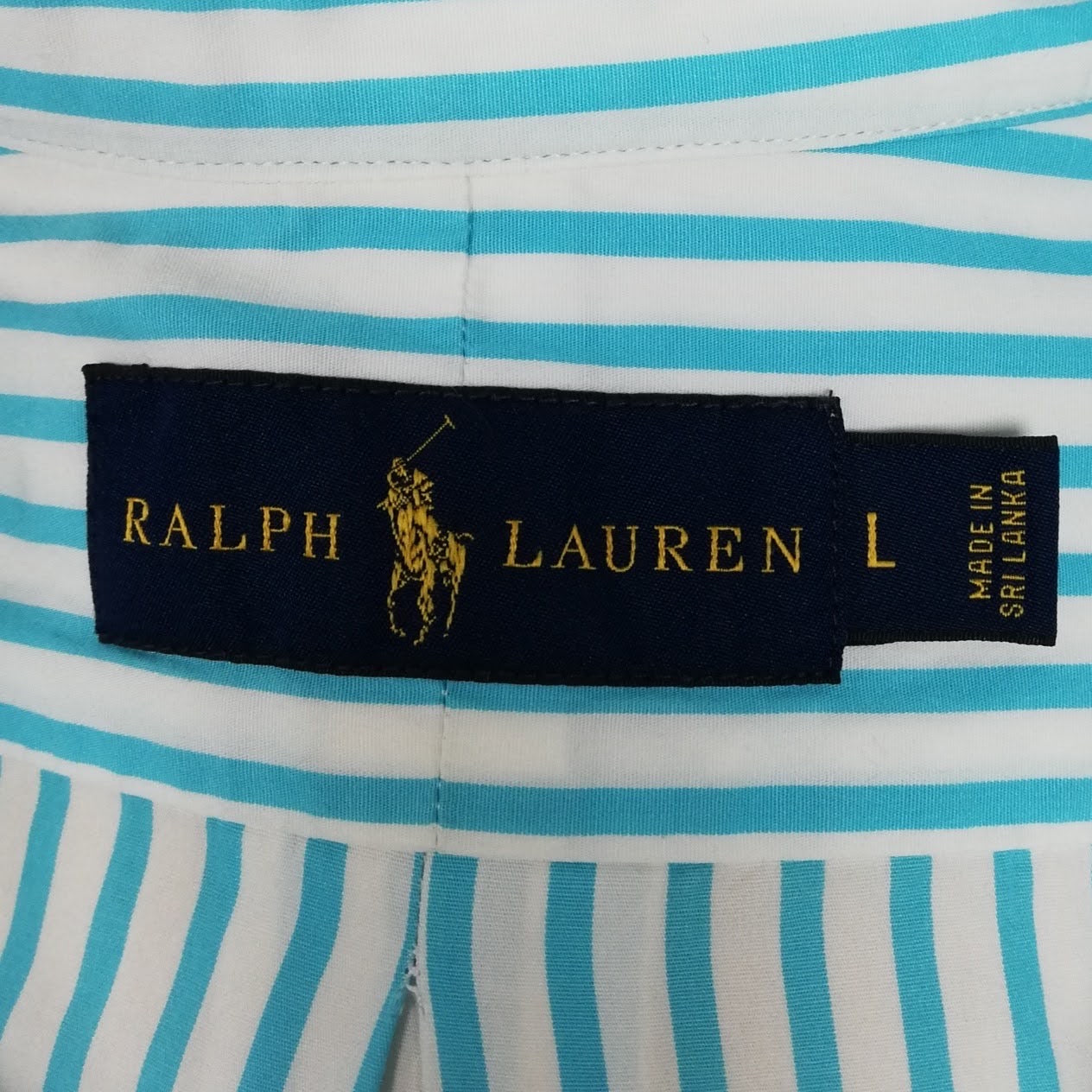 Camisa Polo Ralph Lauren 🏇🏼 Color blanco con patron de rayas en color turquesa Talla L Entalle Regular