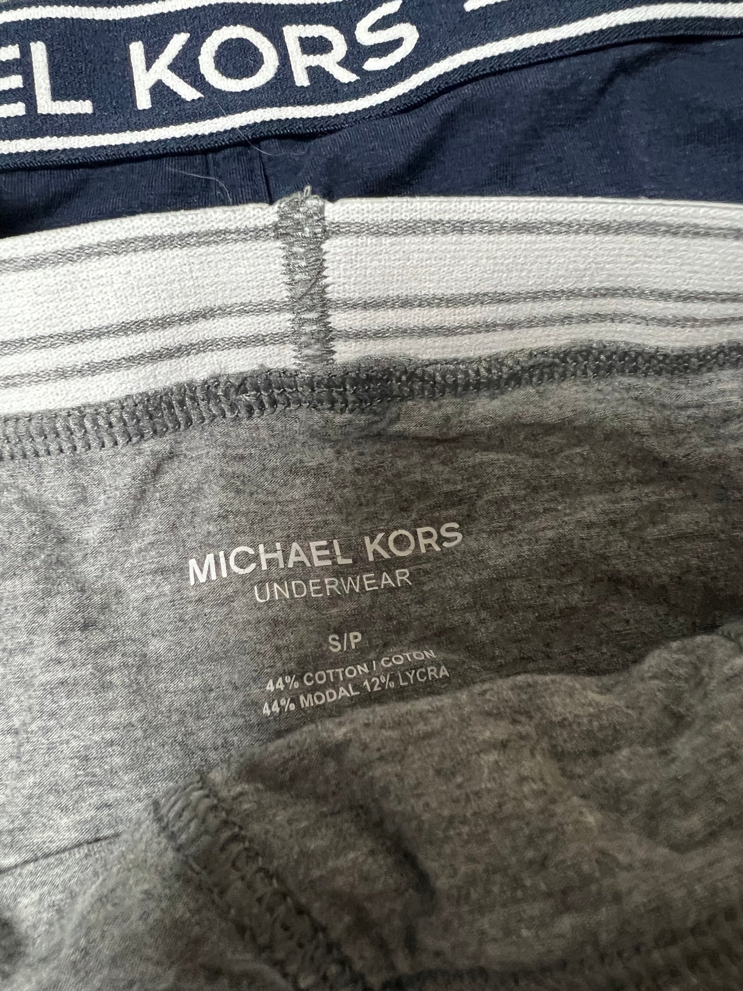 Boxers Briefs Michael Kors color azul navy, gris claro y gris con rayas Talla S
