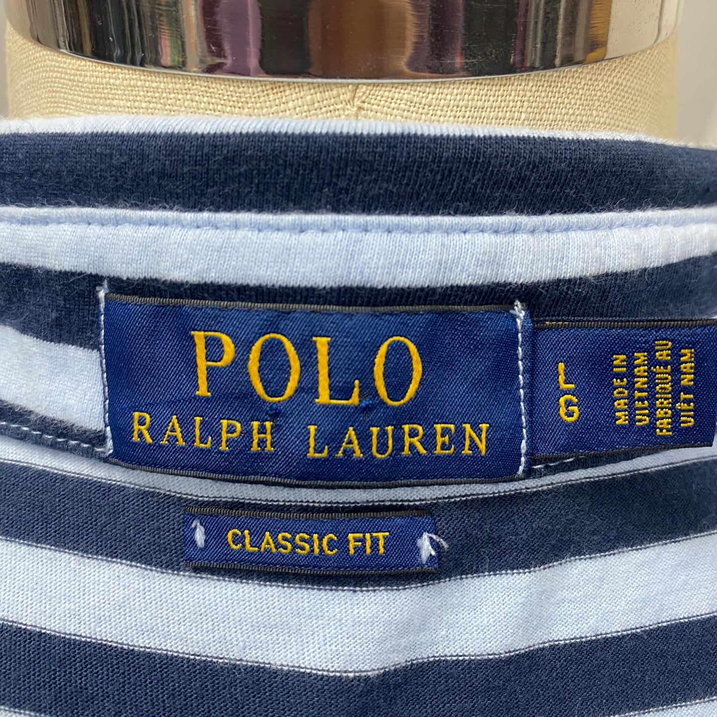 Camiseta Polo Ralph Lauren 🏇🏼con patron de rayas en color celeste y azul navy Talla L Entalle Clásico