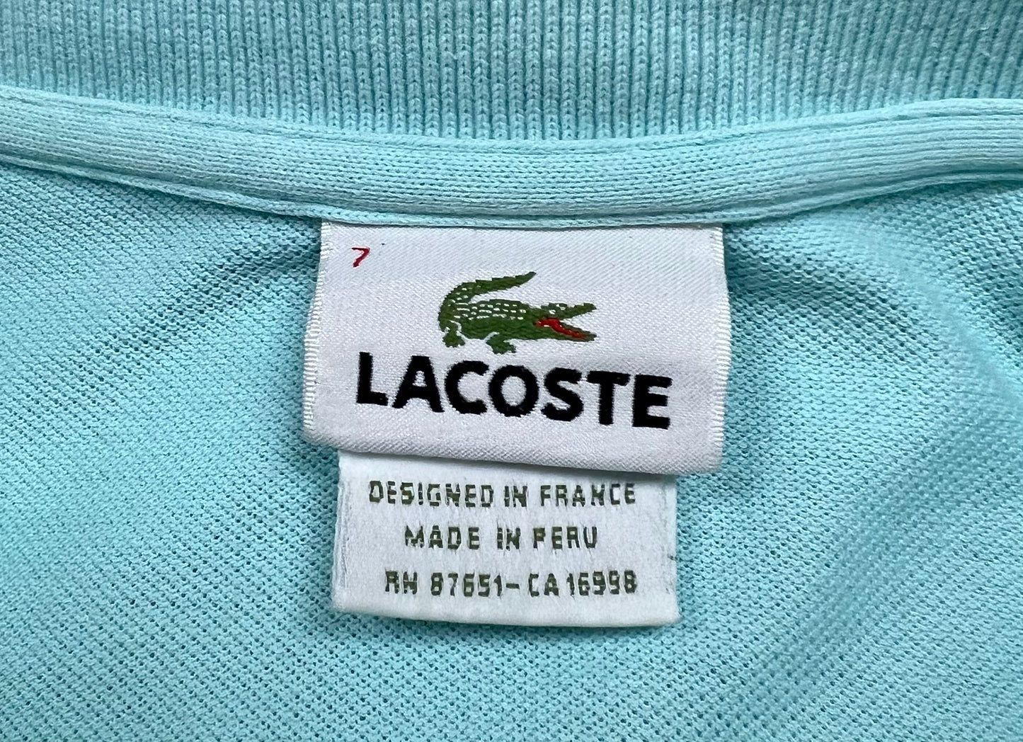 Camiseta Polo Lacoste 🐊 color celeste Talla L Entalle Regular