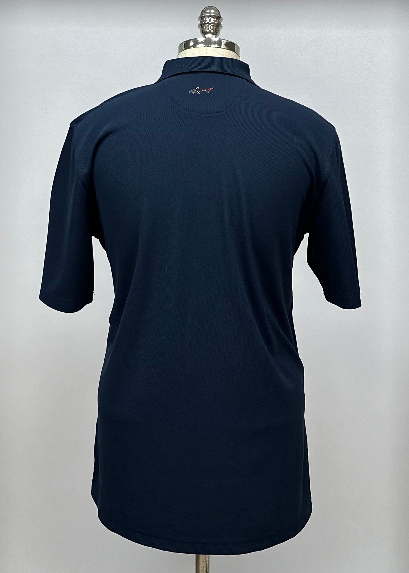 Camiseta Polo Greg Norman ⛳️ Tela performance color azul navy Talla L Entalle Regular