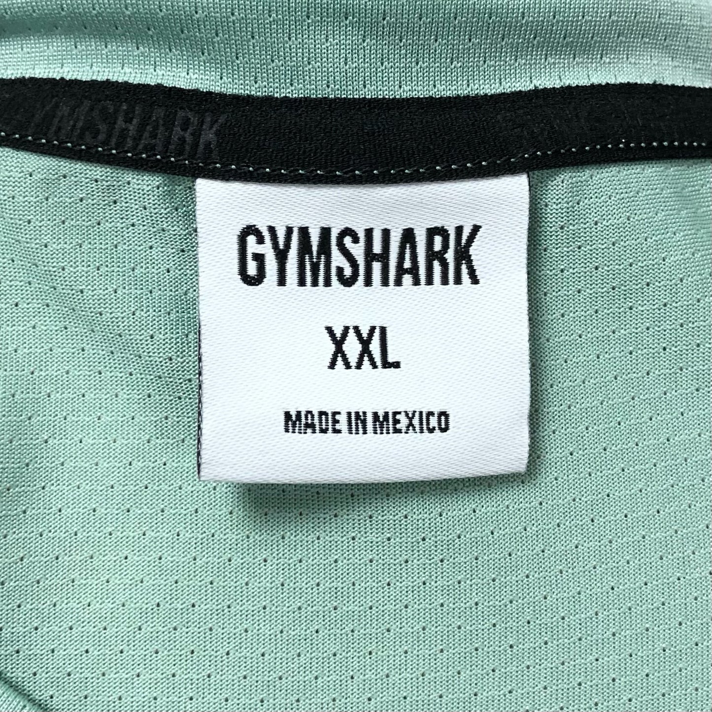 Camiseta de entrenamiento Gymshark 🏋🏽 color verde claro y logo en blanco Talla XXL
