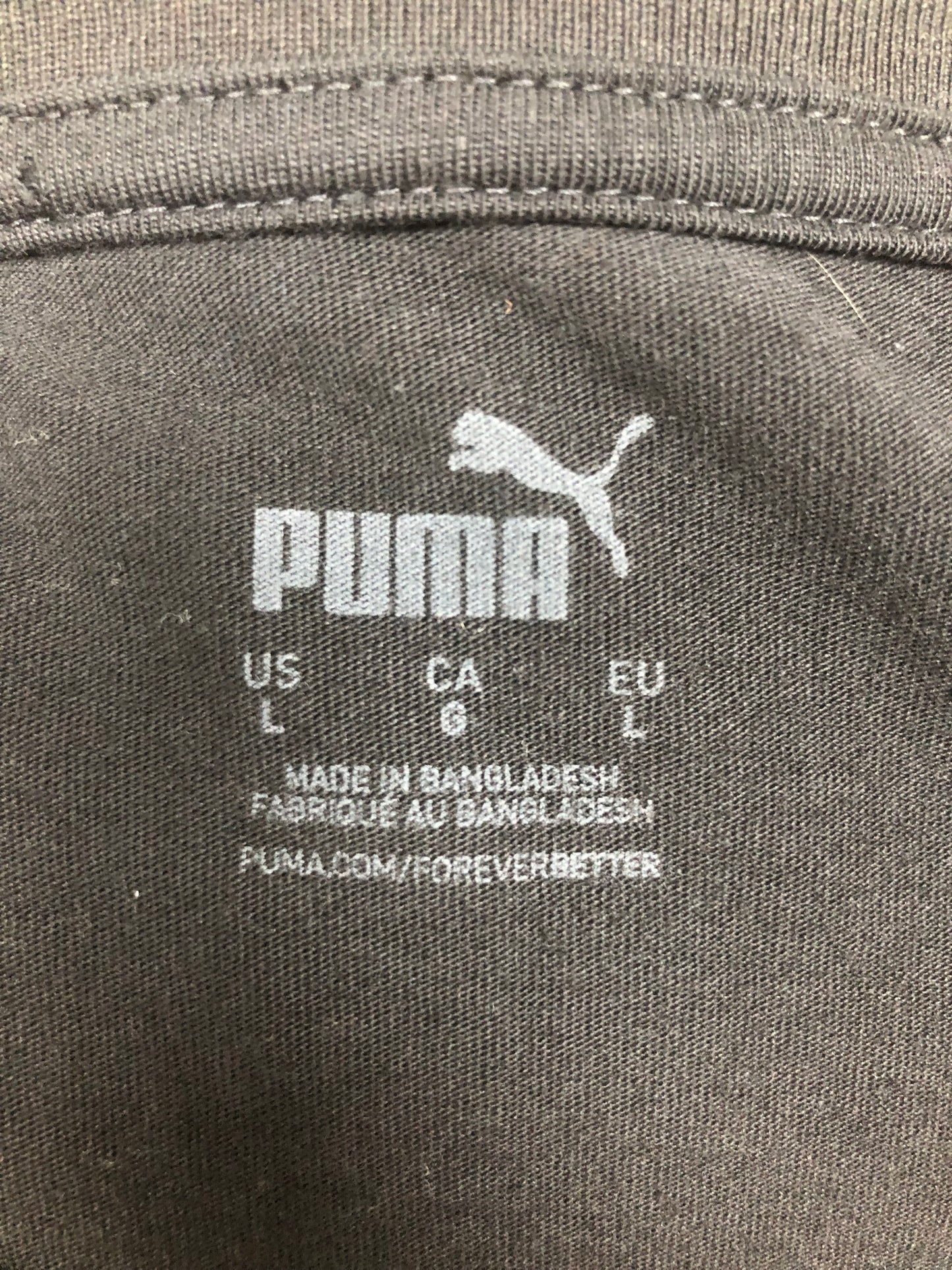 Camiseta cuello redondo Puma 🐆 color negro con el logo en rojo y blanco Talla L
