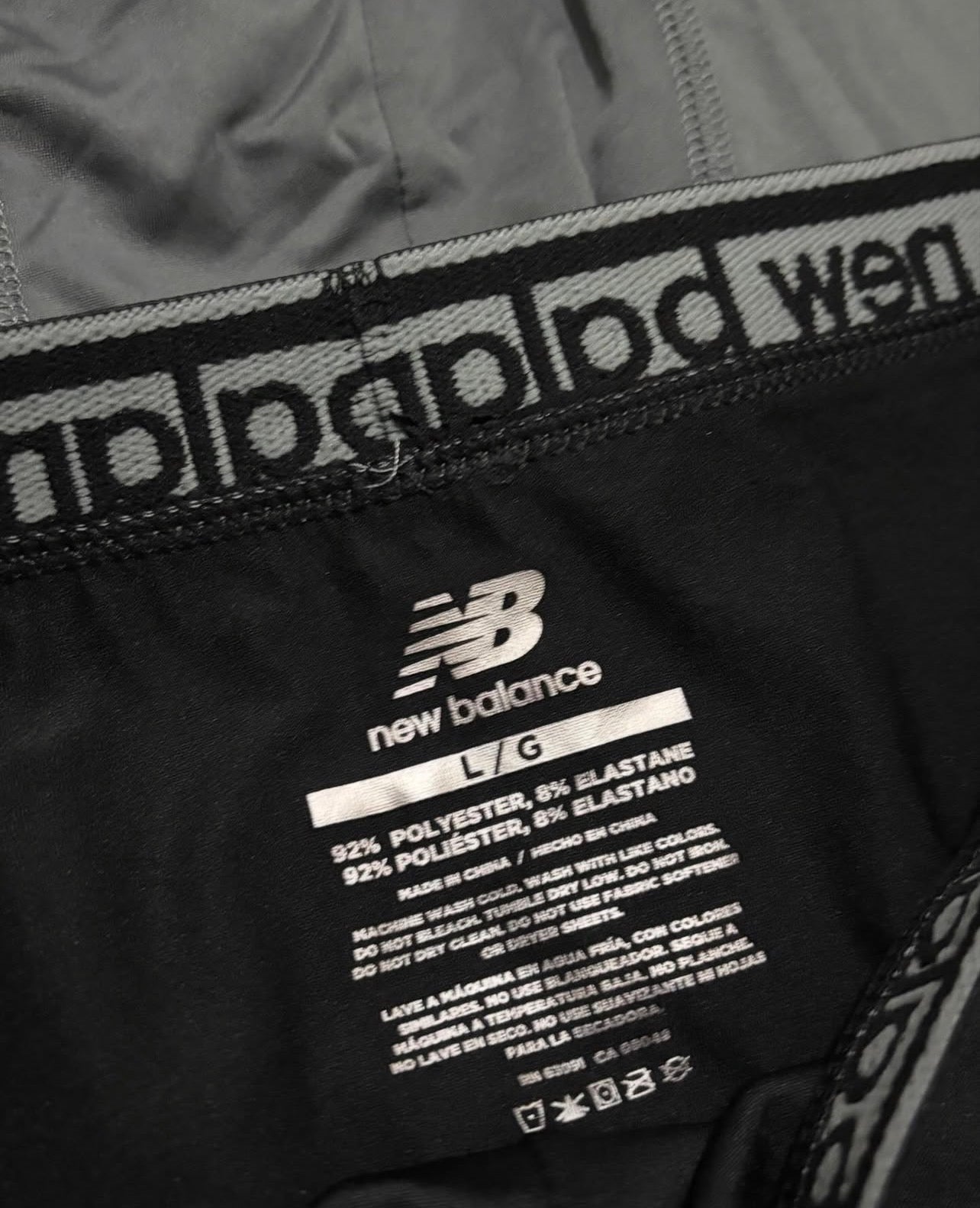 Combo de 4 Boxers Briefs New Balance Tela Performance color Negro y gris Talla L