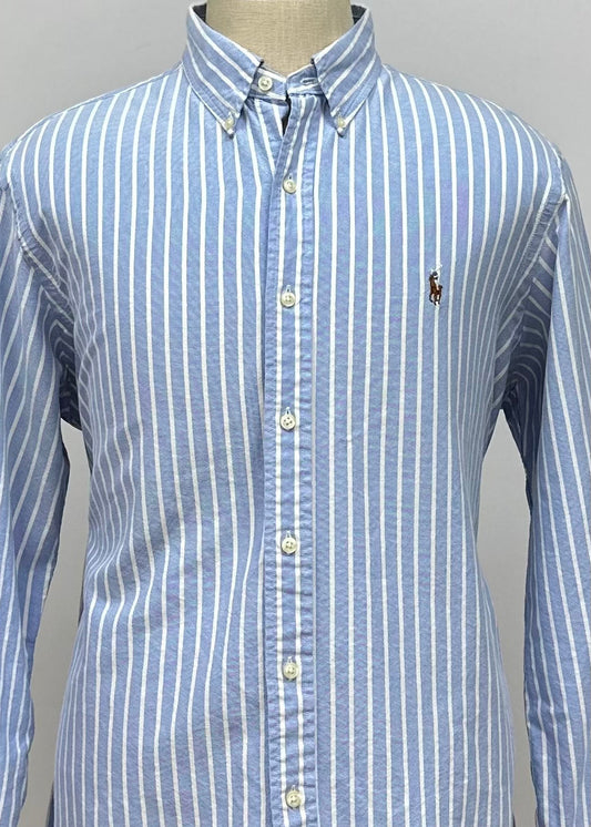 Camisa Polo Ralph Lauren 🏇🏼 Oxford color celeste con rayas en color blanco Talla L Entalle Regular
