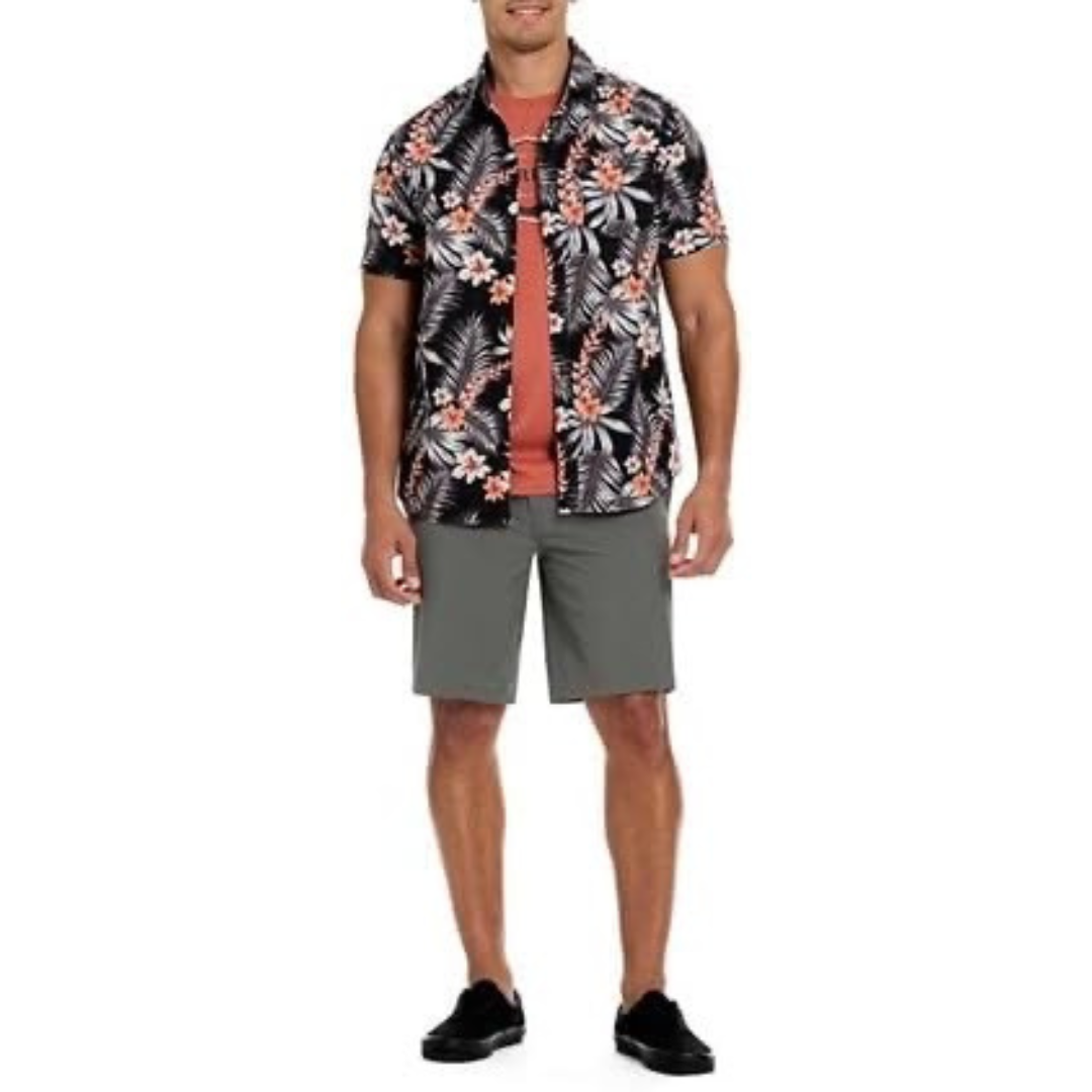 Camisa de botones Hurley 🏄🏽‍♂️ color negro con diseño de flores Talla L Entalle Regular