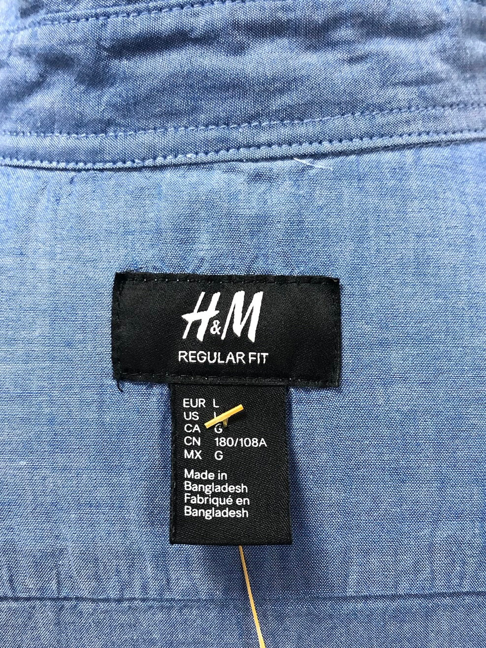 Camisa H&M 🇸🇪 color azul grisáceo Talla L Entalle Regular