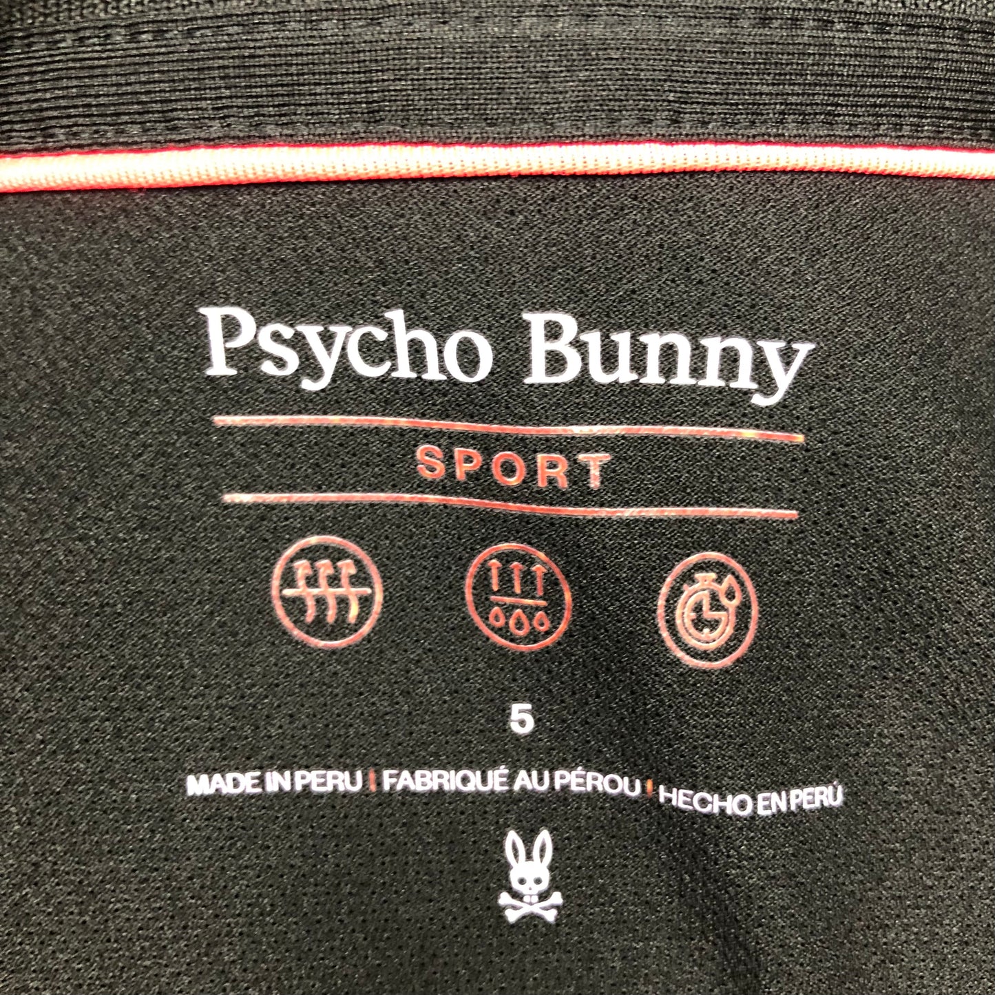 Camiseta Polo Psycho Bunny 🐰  Micro mesh en color negro y rosado con diseño de cuello Talla M Entalle Regular