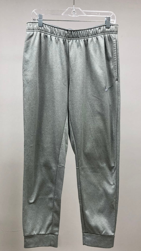 Pantalon Jogger marca Nike ✔️ color gris degradado Talla L