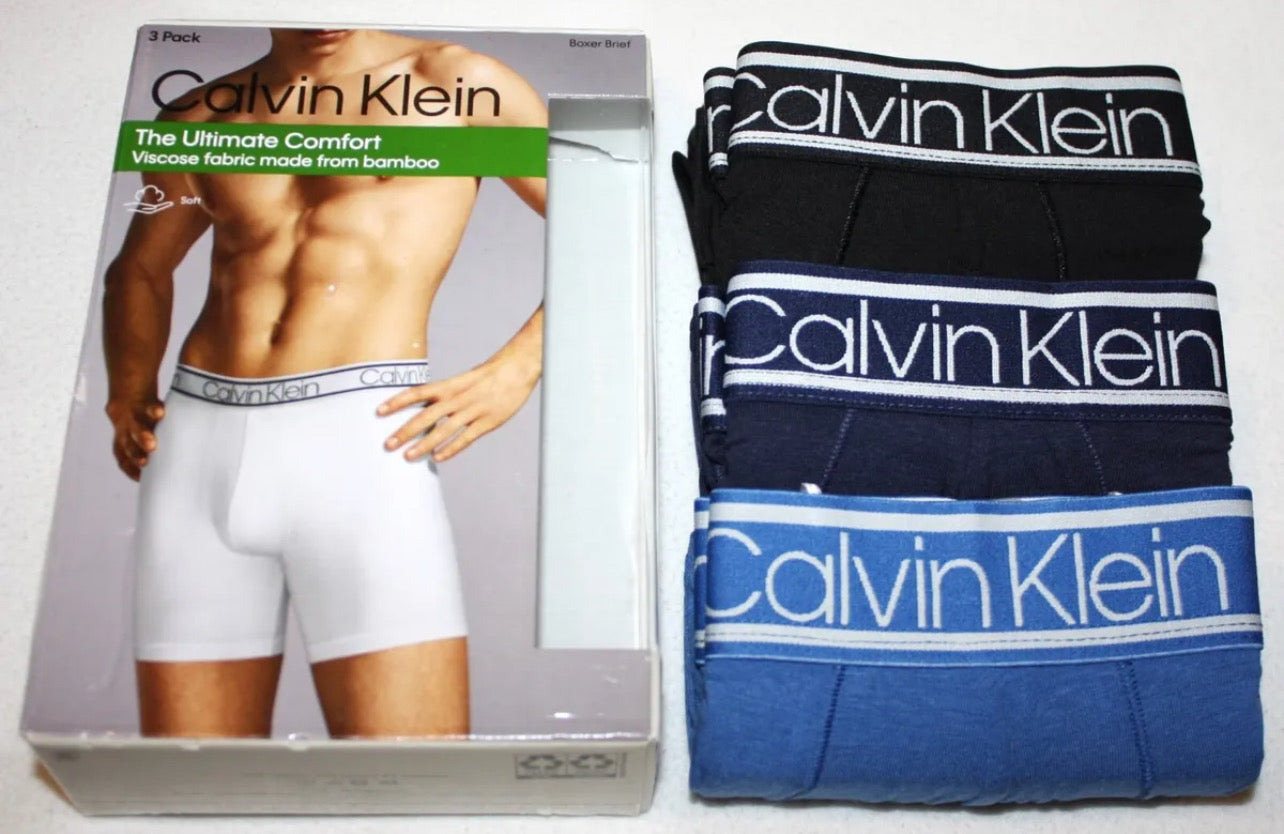 Paquete de 3 Calzoncillos tipo Boxer Calvin Klein The Ultimate Comfort en color azul, verde y negro - Tela ligera en Talla XL