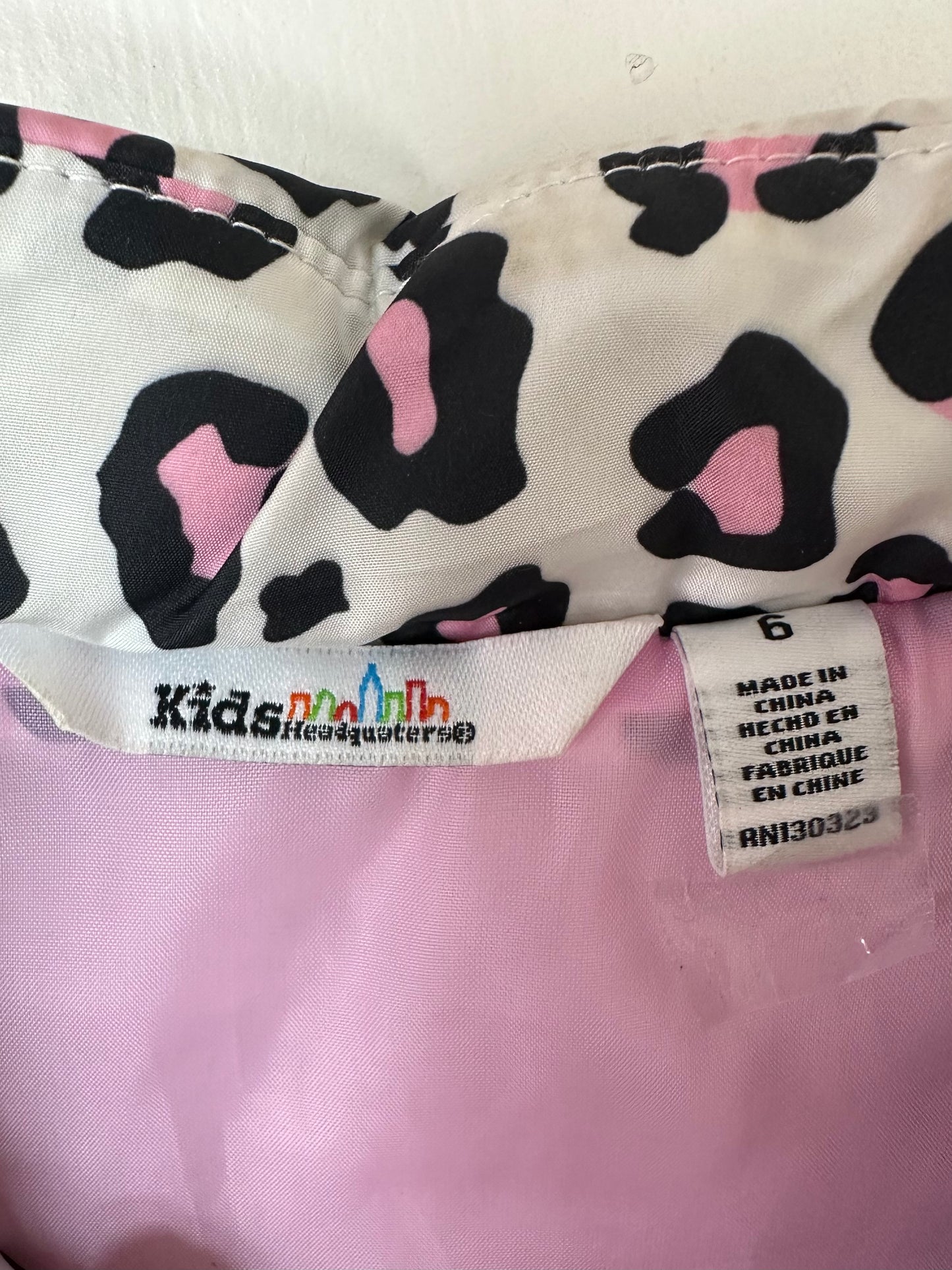 Chaleco acolchado (puffer) de niña Kids Headquarters🌆 Con diseño de animal print blanco rosado y negro Talla 6