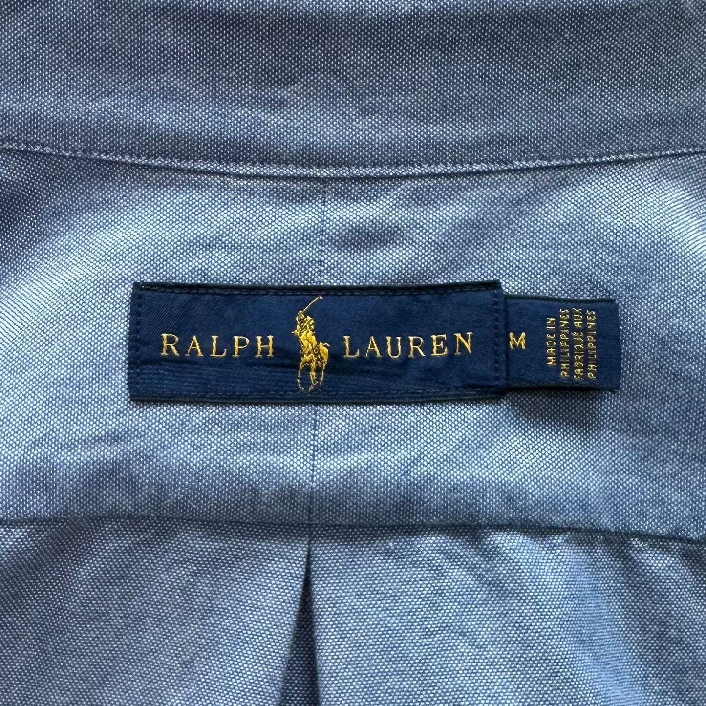 Camisa de Mujer Polo Ralph Lauren 🏇🏼 en color celeste con diseño de múltiples logos en color azul Talla M Entalle Regular