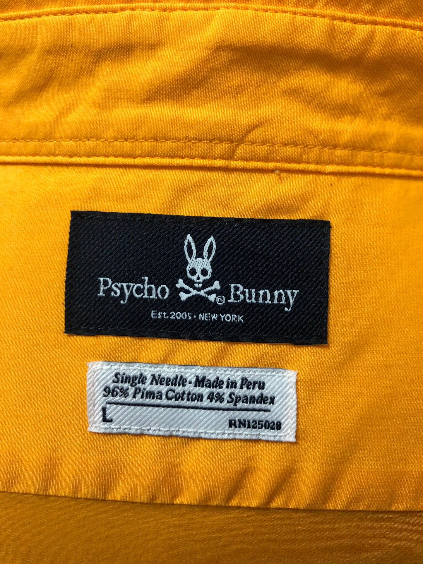 Camisa de botones Psycho Bunny 🐰  Color naranja intenso con logo tradicional Talla L Entalle Regular