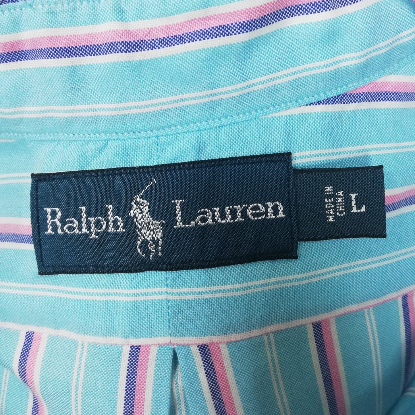 Camisa Polo Ralph Lauren 🏇🏼 color celeste con rayas en color rosado, azul y blanco Talla L Entalle Regular