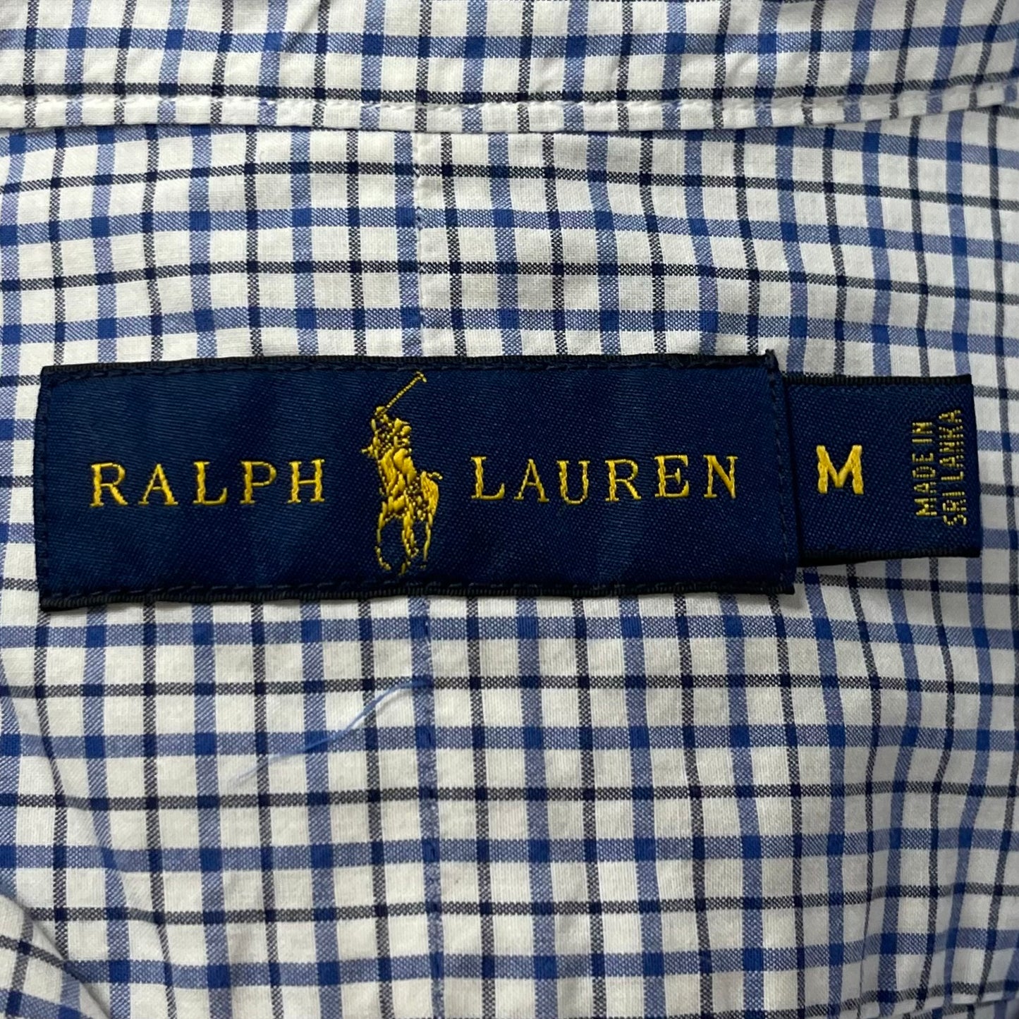 Camisa Polo Ralph Lauren 🏇🏼 color blanco con patron de cuadros en color azul y negro Talla M Entalle Regular