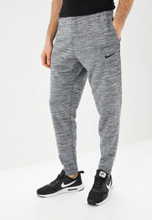 Pantalon Jogger marca Nike ✔️ con diseño degradado en color gris Talla L