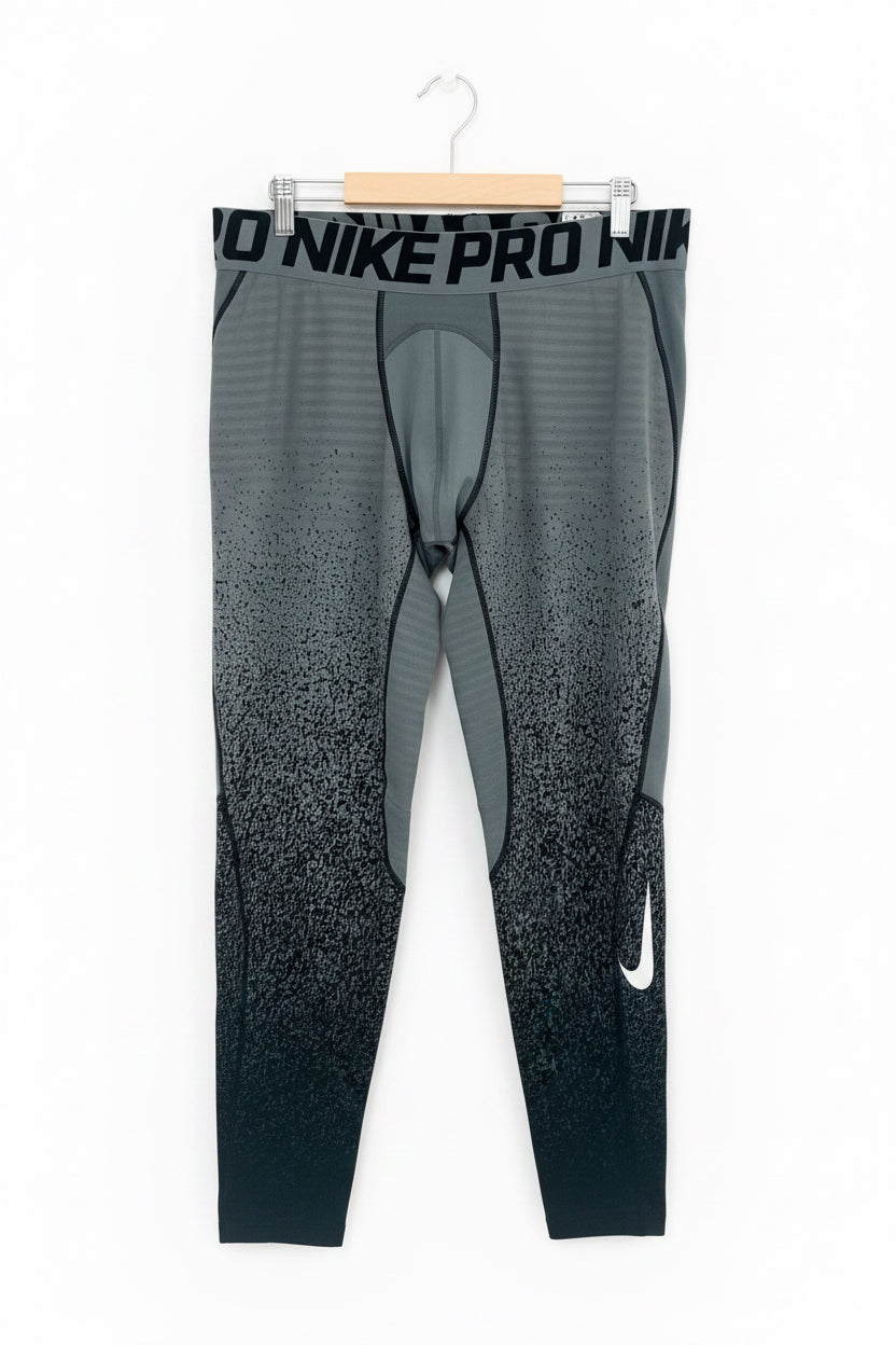 Mallas de entrenamiento licra Nike ✔️ Pro Dri-FIT de hombre color gris con diseño degradado en negro Talla XXL