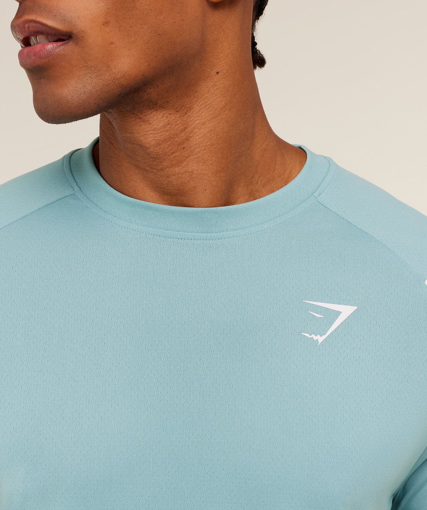 Camiseta de entrenamiento cuello redondo Gymshark 🏋🏽 color celeste con líneas y logo en blanco Talla L