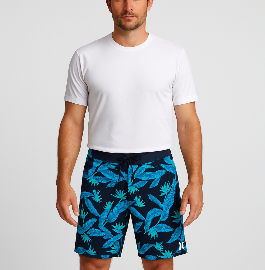 Short de baño Hurley 🏄🏽‍♂️ color negro con patrón de hojas en celeste Talla 32