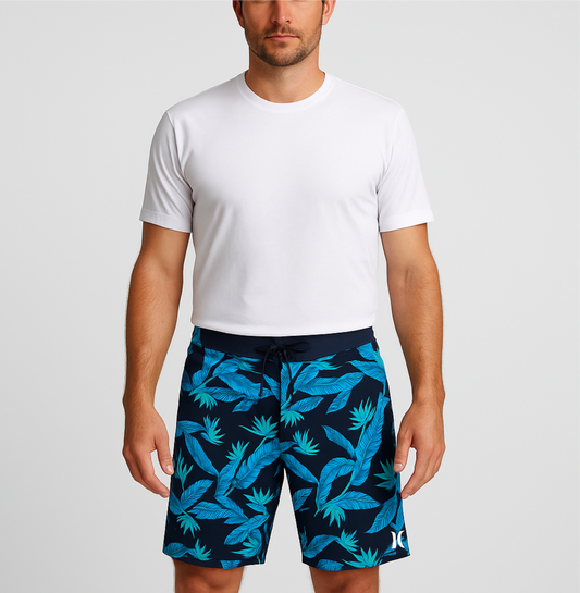 Short de baño Hurley 🏄🏽‍♂️ color negro con patrón de hojas en celeste Talla 32