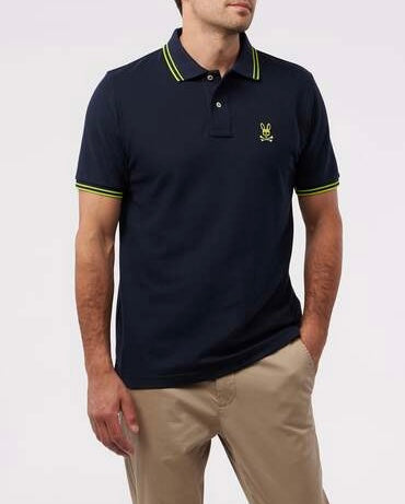 Camiseta Polo Psycho Bunny 🐰 Pique en color azul navy con diseño de cuello en verde intenso Talla M Entalle Regular