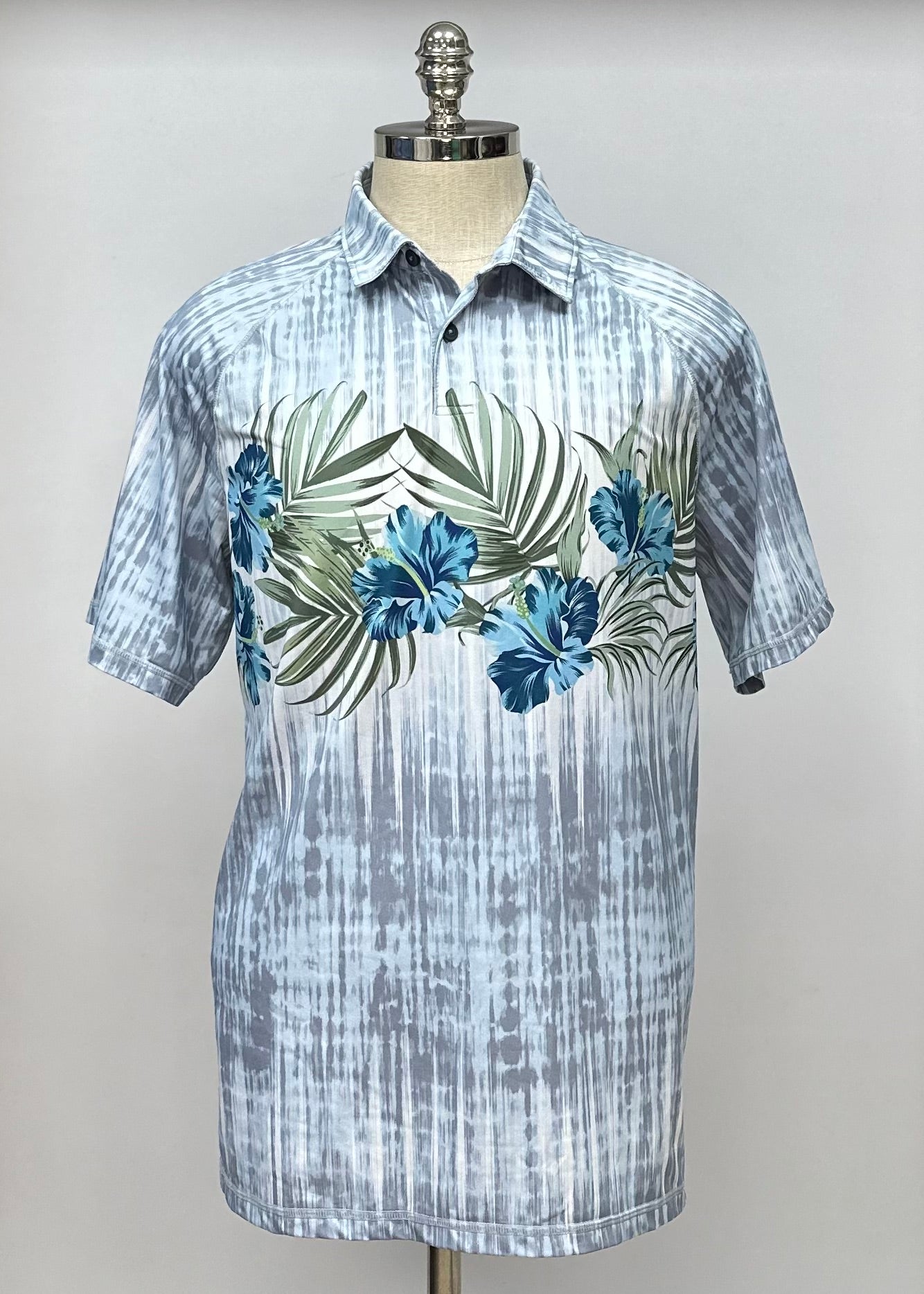 Camiseta Polo Tommy Bahama 🐬 color gris y blanco con diseño floral Talla L Entalle Regular