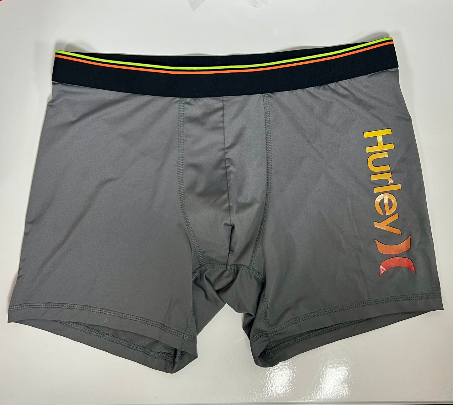 Boxers Briefs Hurley 🏄🏽‍♂️ Tela Performance color gris y naranja intenso Talla XL