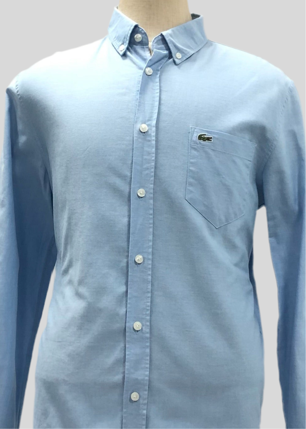 Camisa de botones Lacoste 🐊 Oxford color celeste Talla L Entalle Regular