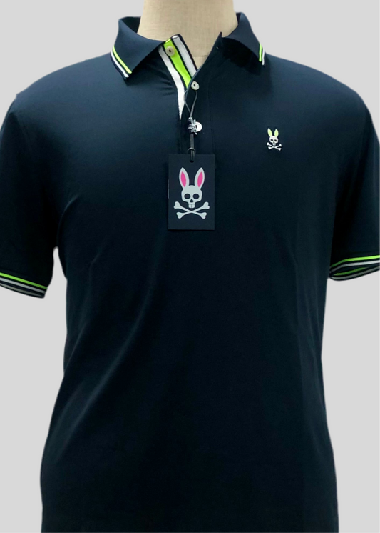 Camiseta Polo Psycho Bunny 🐰 Dry-fit en color azul navy con diseño de cuello en verde y blanco Talla M Entalle Regular