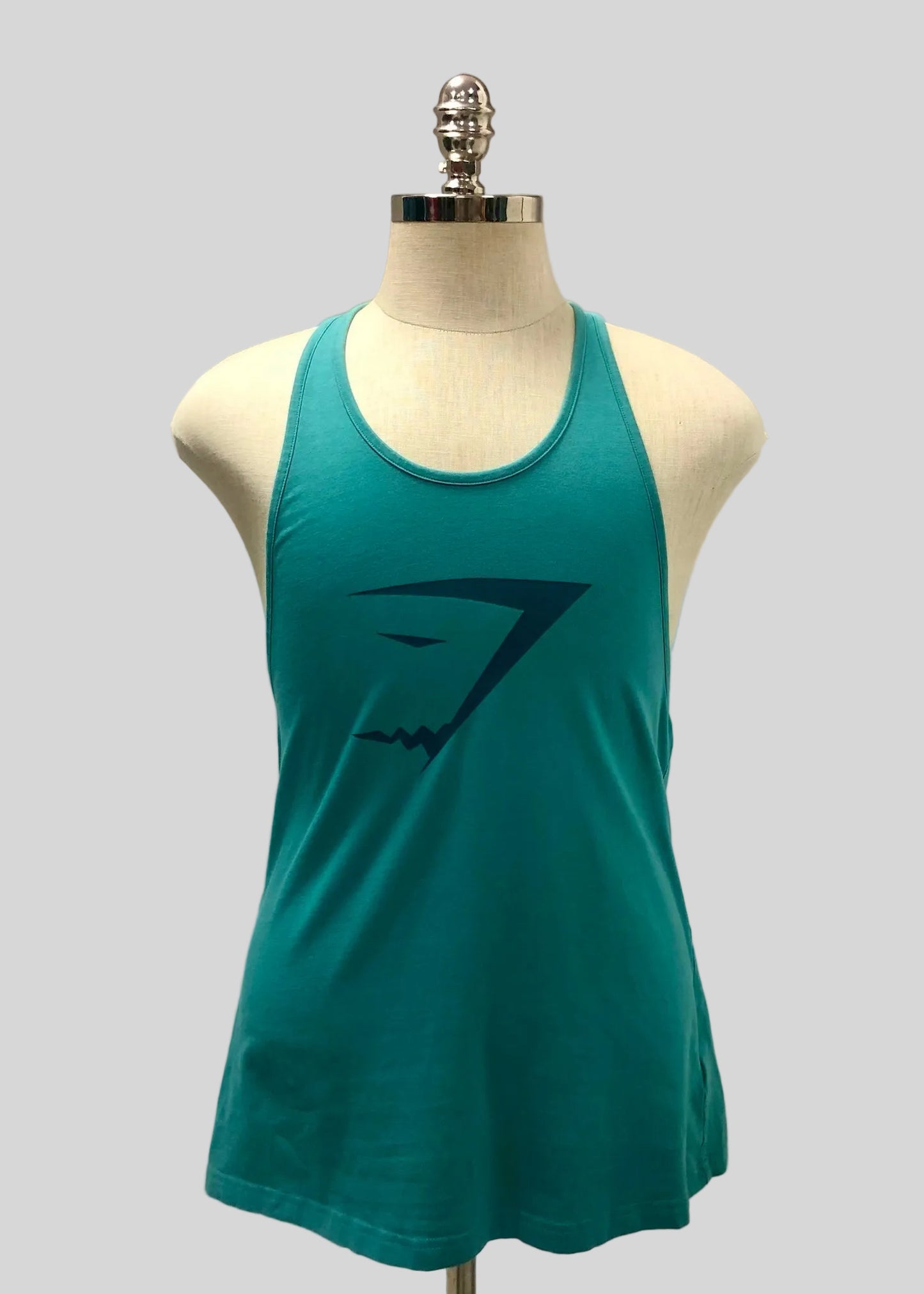 Camiseta de entrenamiento sin mangas Gymshark 🏋🏽 color verde esmeralda y logo en negro Talla S