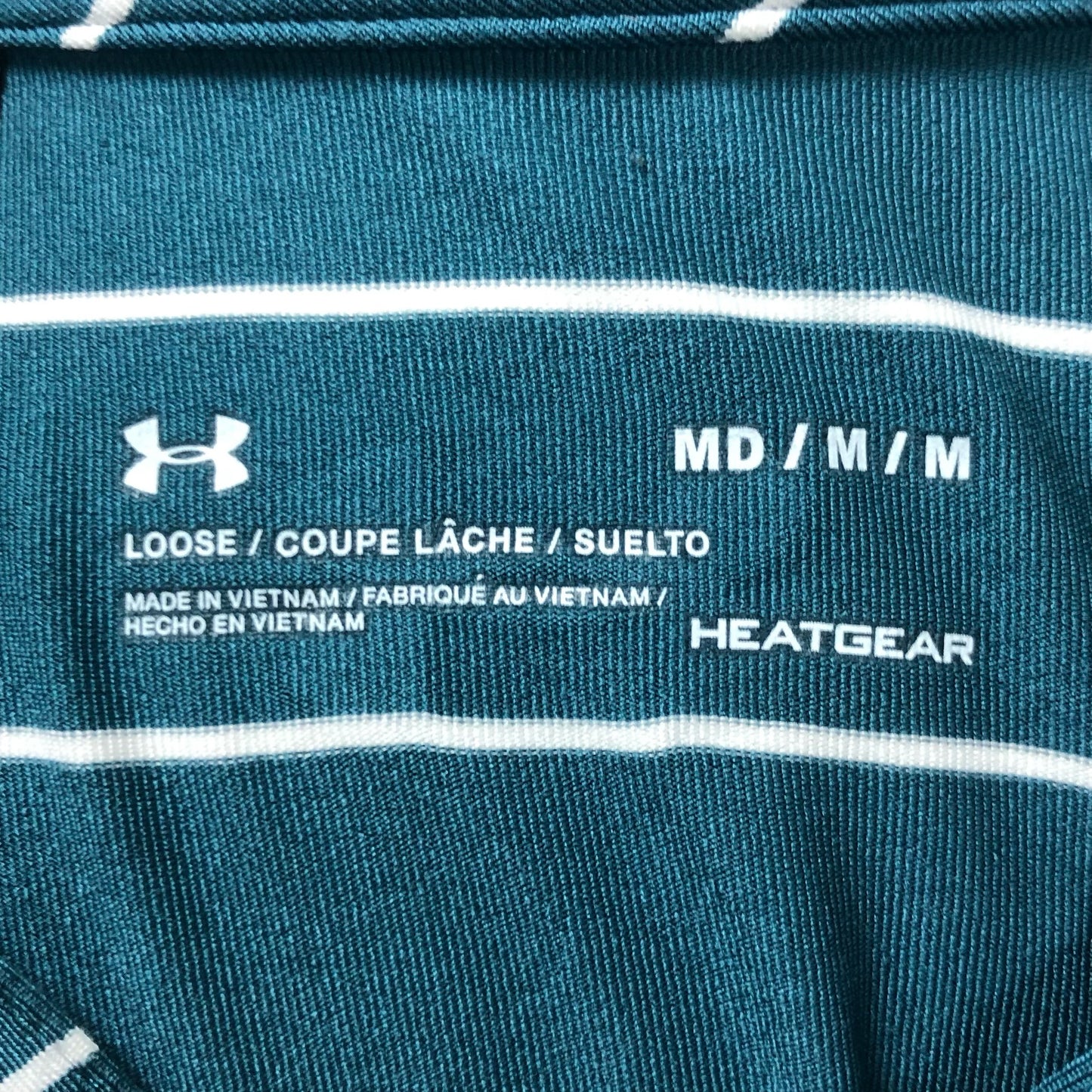 Camiseta polo Under Armour 🏋🏻 de rayas en verde esmeralda y azul navy Tela Performance Talla M Entalle Regular