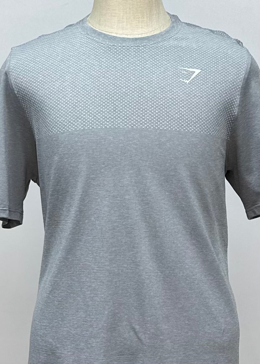 Camiseta de entrenamiento cuello redondo Gymshark 🏋🏽 color gris manga corta Talla XL (ver descripción)