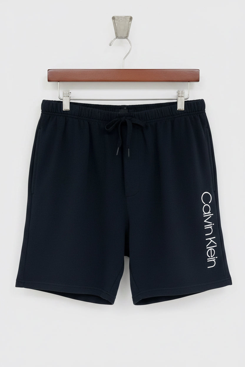 Short Lounge Calvin Klein 🇺🇸 color azul navy y logo en blanco Talla XL
